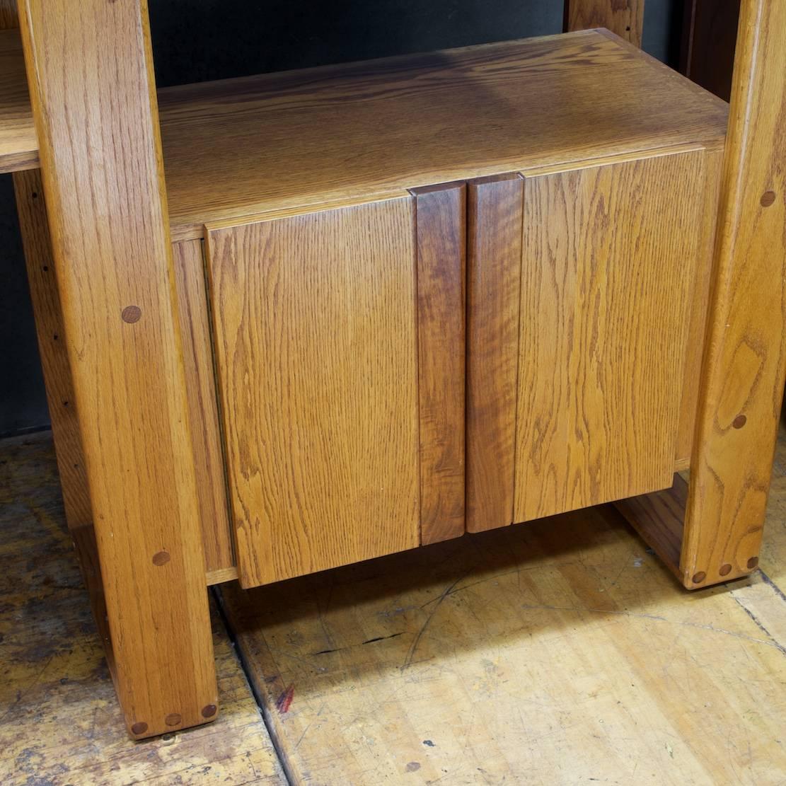 Rare low production California Craft Furniture. A self standing wall unit, shown here in a 3 Bay configuration. The seven shelves can be moved around, or removed and the drop-leaf desk bay and low cabinet bay columns can be used separately.

Hand