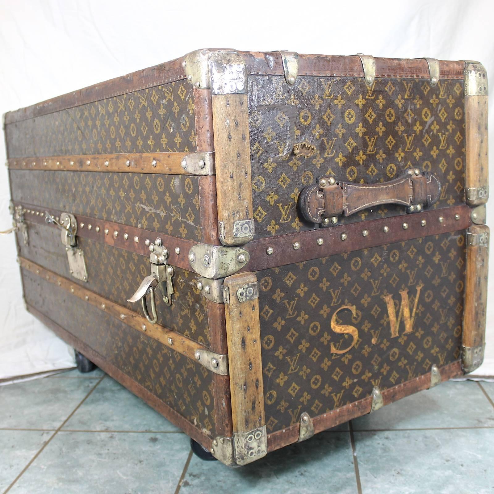 Louis Vuitton steamer wardrobe trunk belonged to Sybil Whigham (Young), and is monogrammed as such. Condition is consistent with age and use. It has undergone a very mild restoration - more of a very thorough cleaning, resulting in a rich, timeworn