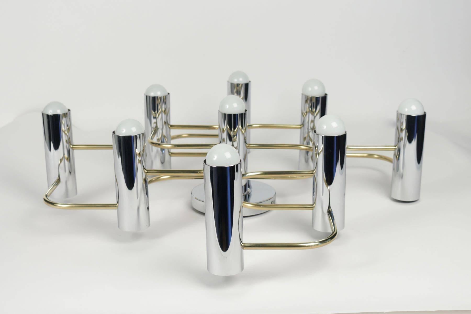 1960s Large Pair of Leola Wall Lights, in the style of Geatano Sciolari.

Each sconces consists of nine lighted arms made of brass and chrome. 
They can be use as ceilling or wall lamps.
