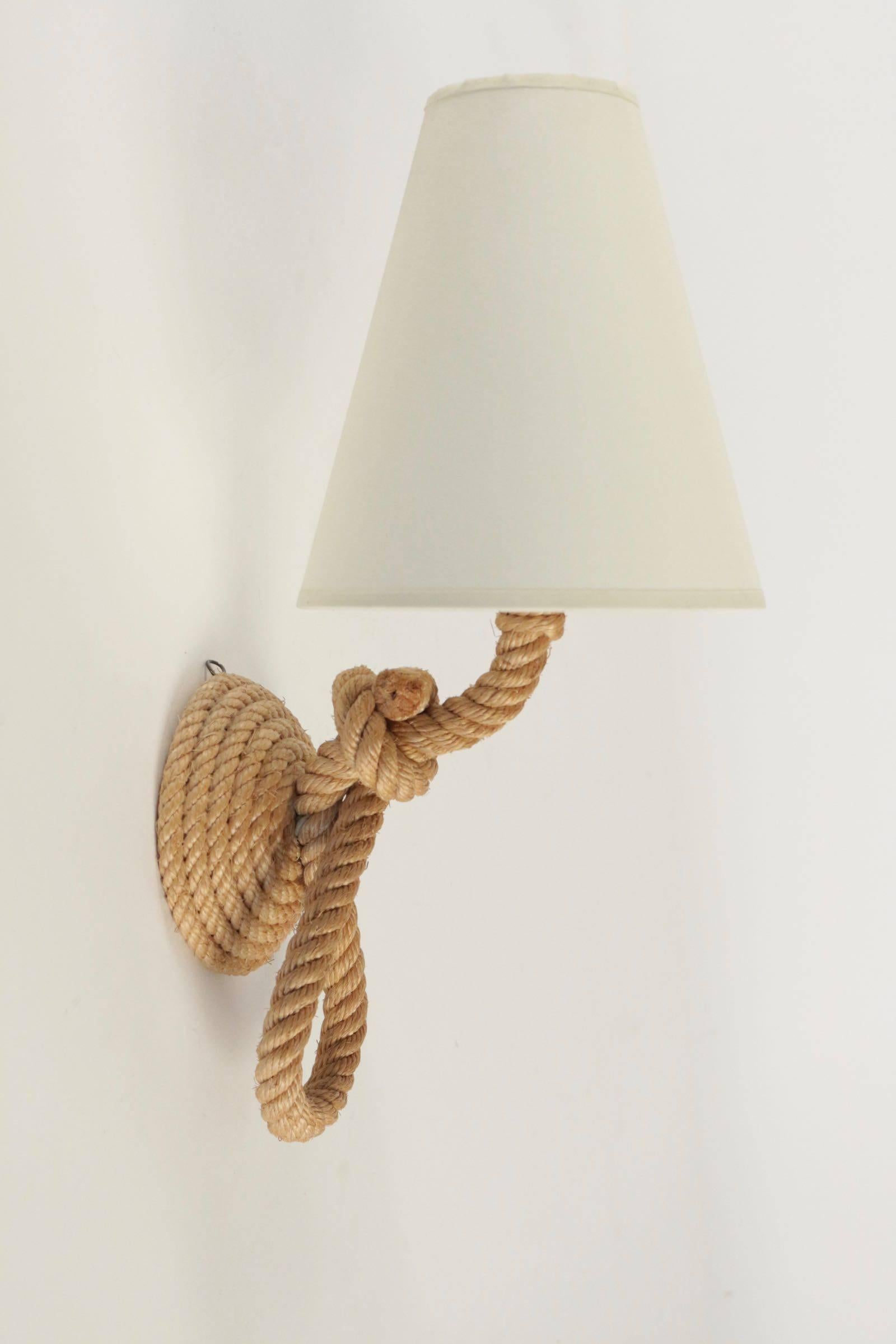 1950s Audoux and Minet pair of rope sconces.
Off-white cotton lampshade.

One bulb per sconces.