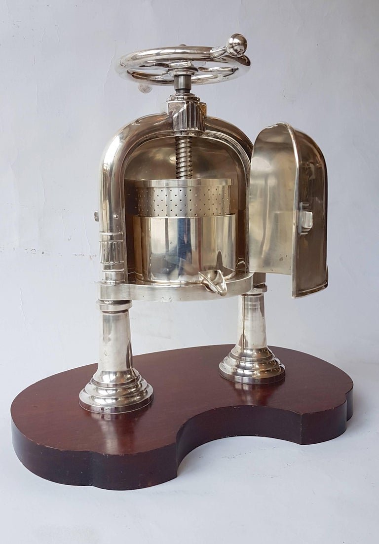 Rare and speciallydesigned silver platered duck press by Christofle
