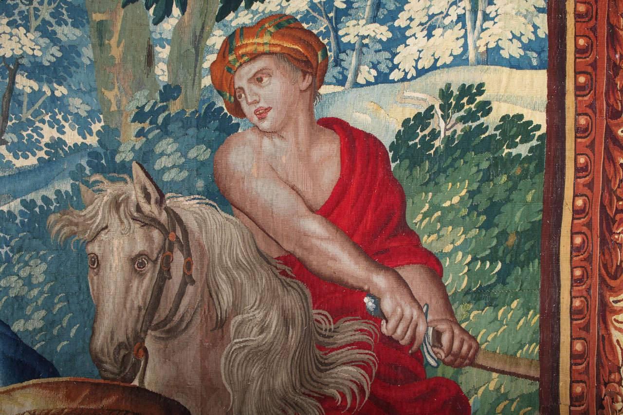 Prächtiger Wandteppich aus Wolle und Seide, Brüssel, zweite Hälfte des 17. Jahrhunderts.
Zeigt eine detaillierte Szene der Stierjagd. Auf dem Hintergrund der Landschaft das Monument der Engelsburg, ein Hinweis auf die römische Kommission.