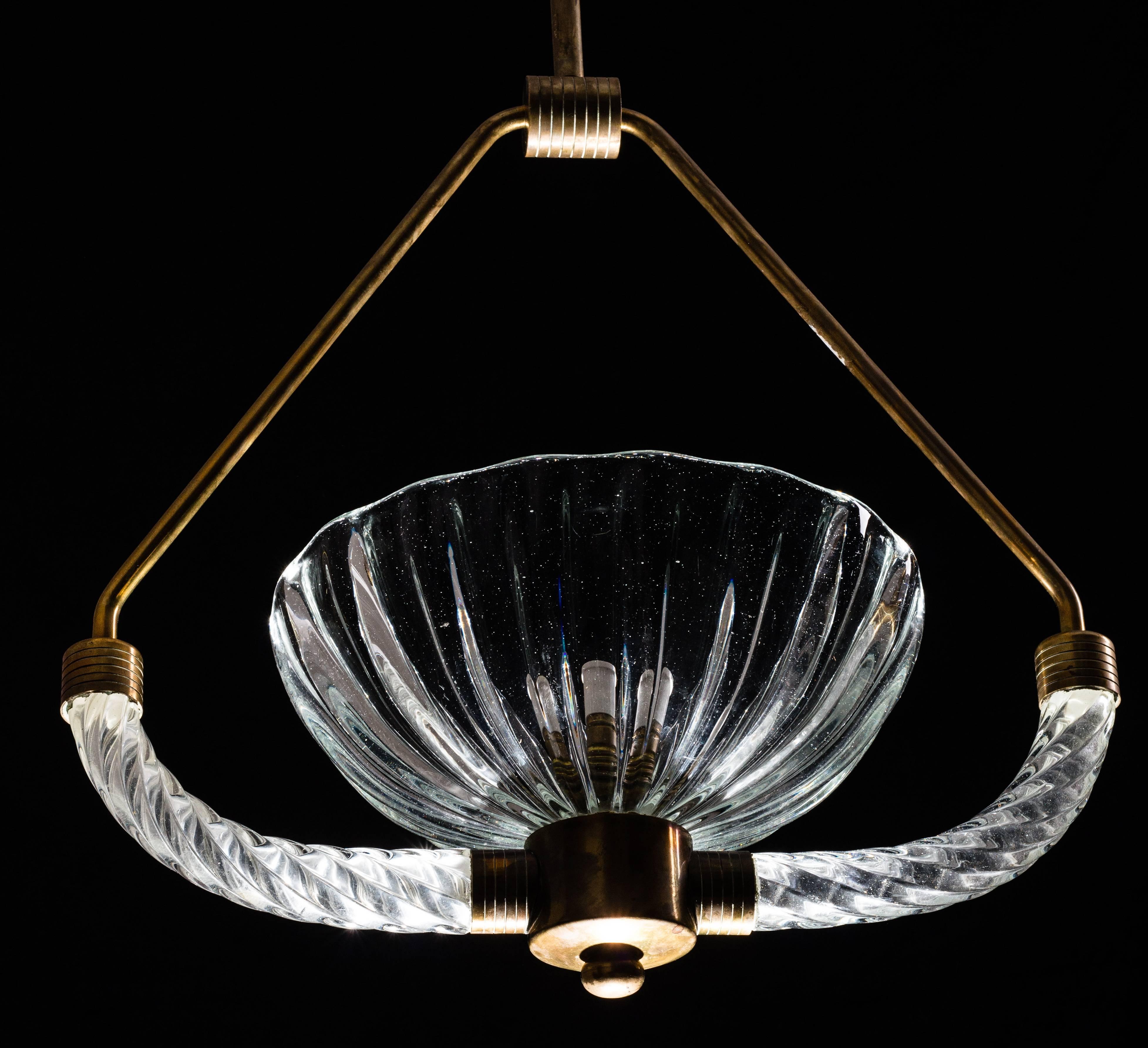 Charming chandelier by Ercole Barovier in Murano glass and brass structure. Original patina.