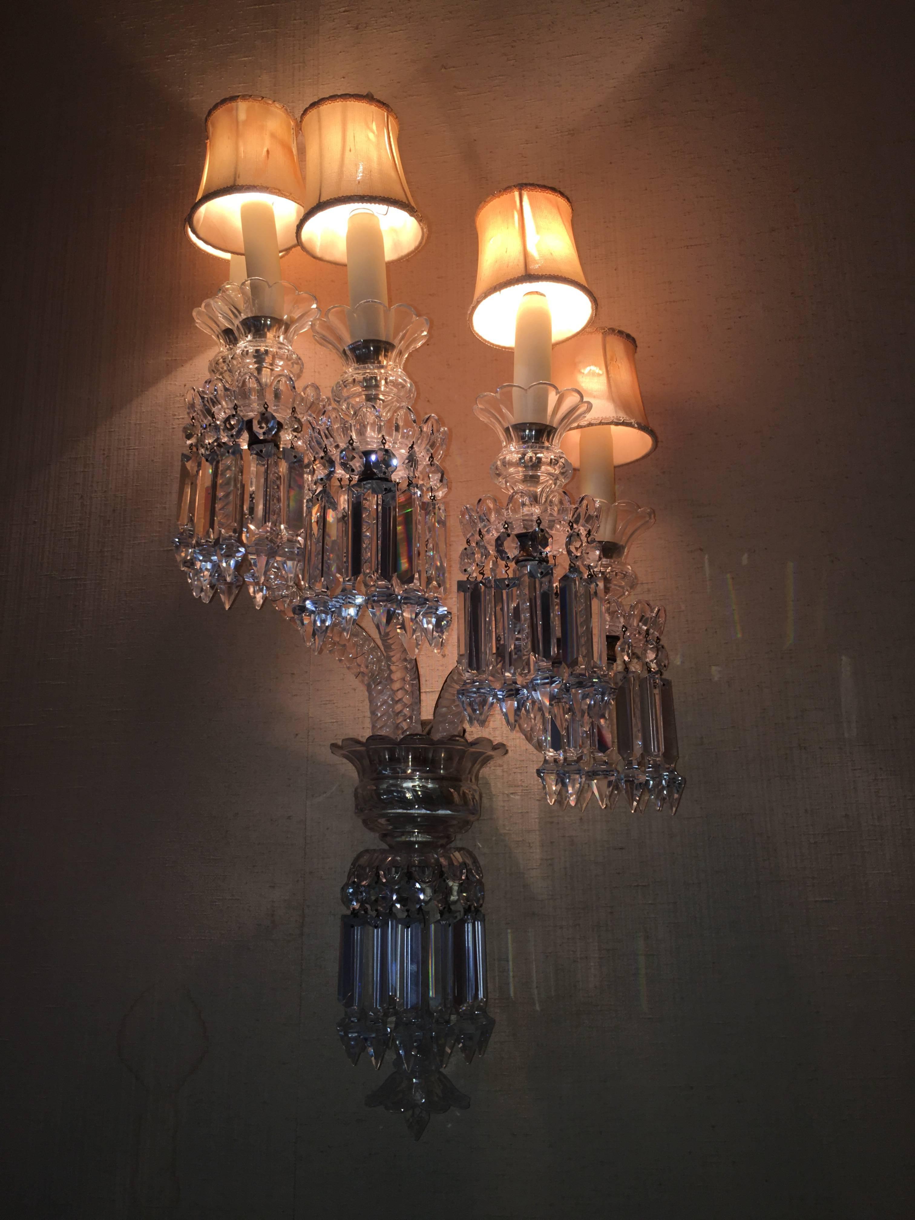 Pair of elegant sconces each with five candleholders.