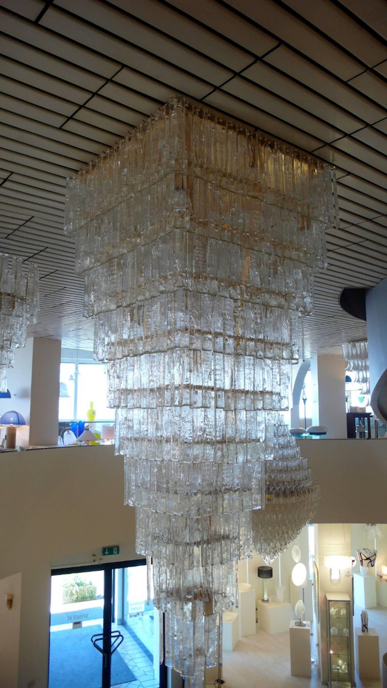 Spectacular Pair of monumental  Murano chandelier with hundreds of precious Murano glasses.
24 E 27  bulbs.