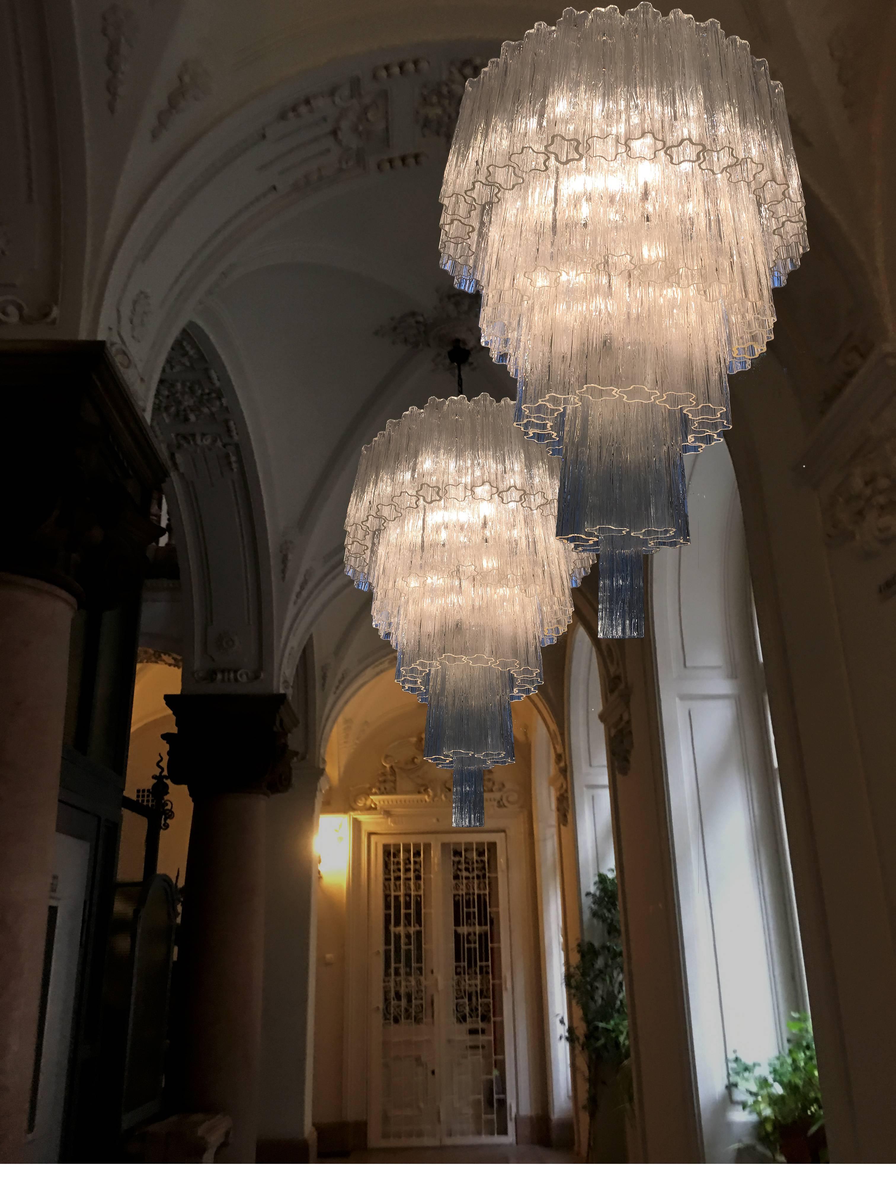 Extraordinary pair of chandeliers by Toni Zuccheri for Venini, 1960 from the Hotel in Dolomiti. Each chandelier is composed by 79 Tronchi 35 cm high, 18 lights. 125 cm without chain!
Two pairs available.
 
