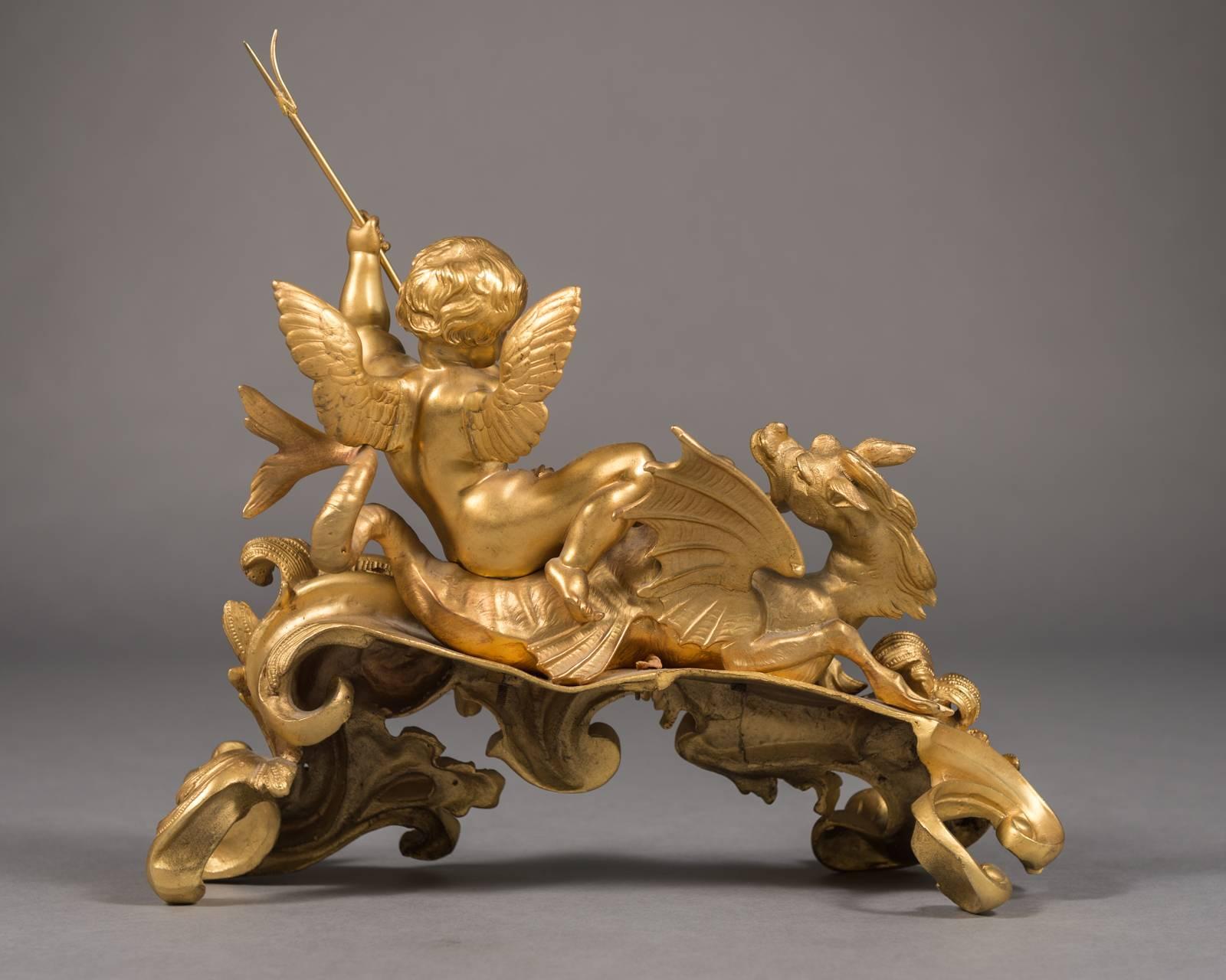 Gilt Fine Pair 19th Century French Figural Chenets Depicting Cherubs and Dragons