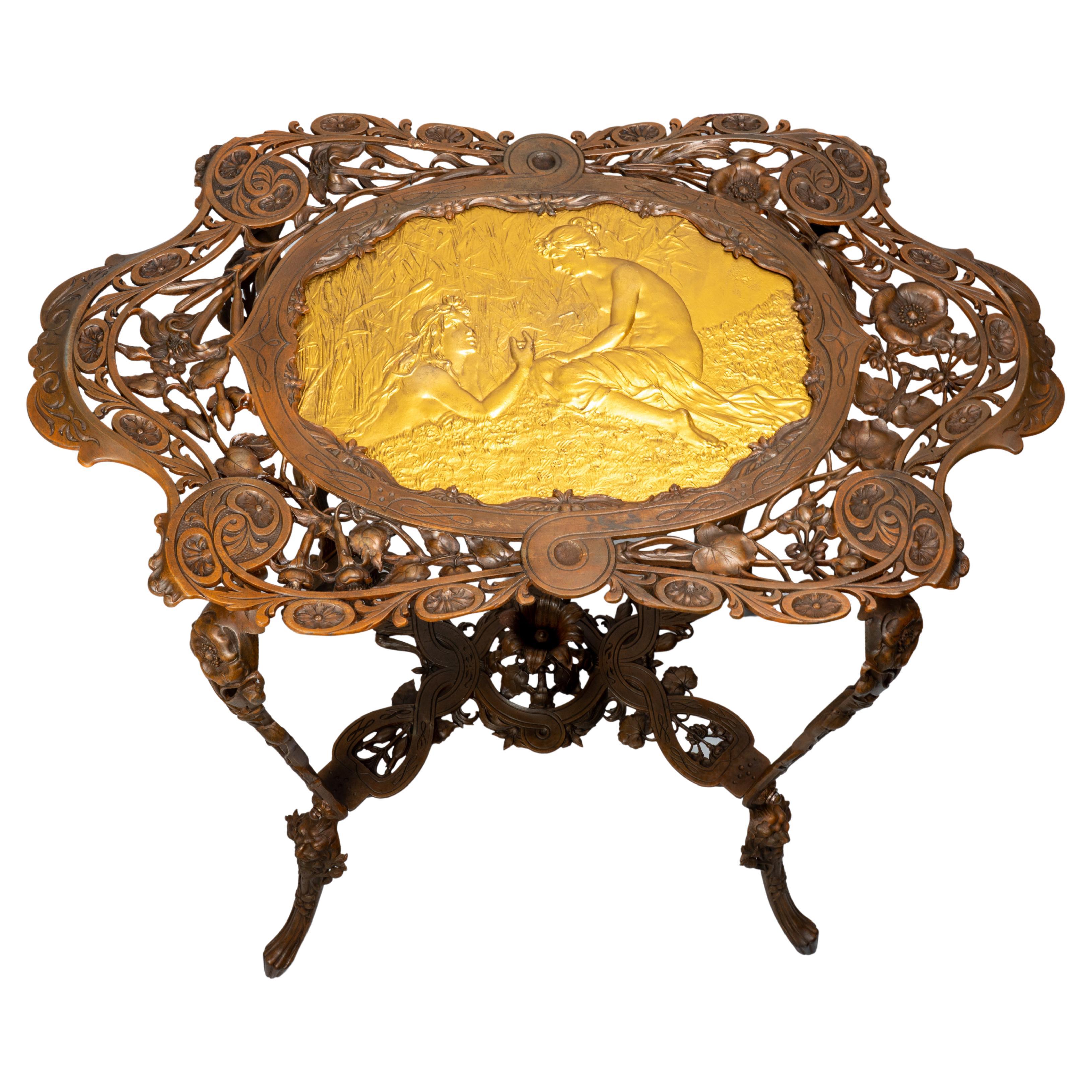 Art Nouveau patinated and gilt cast iron side table For Sale