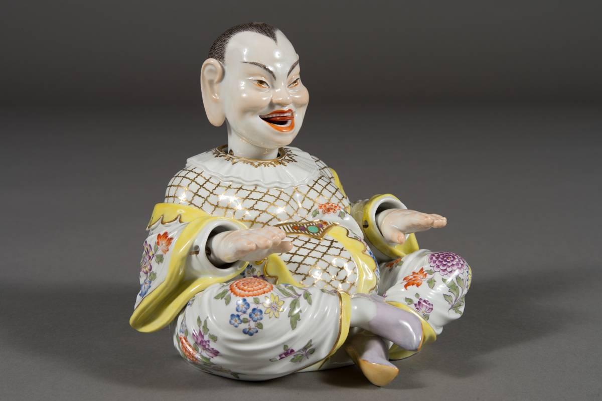 A Meissen Porcelain articulated nodding head pagoda figure.

20th century, blue crossed swords mark on the neck, numbered 67827, painter 126D, body marked with crossed swords, numbered 67828, painter 126D.

Excellent condition.