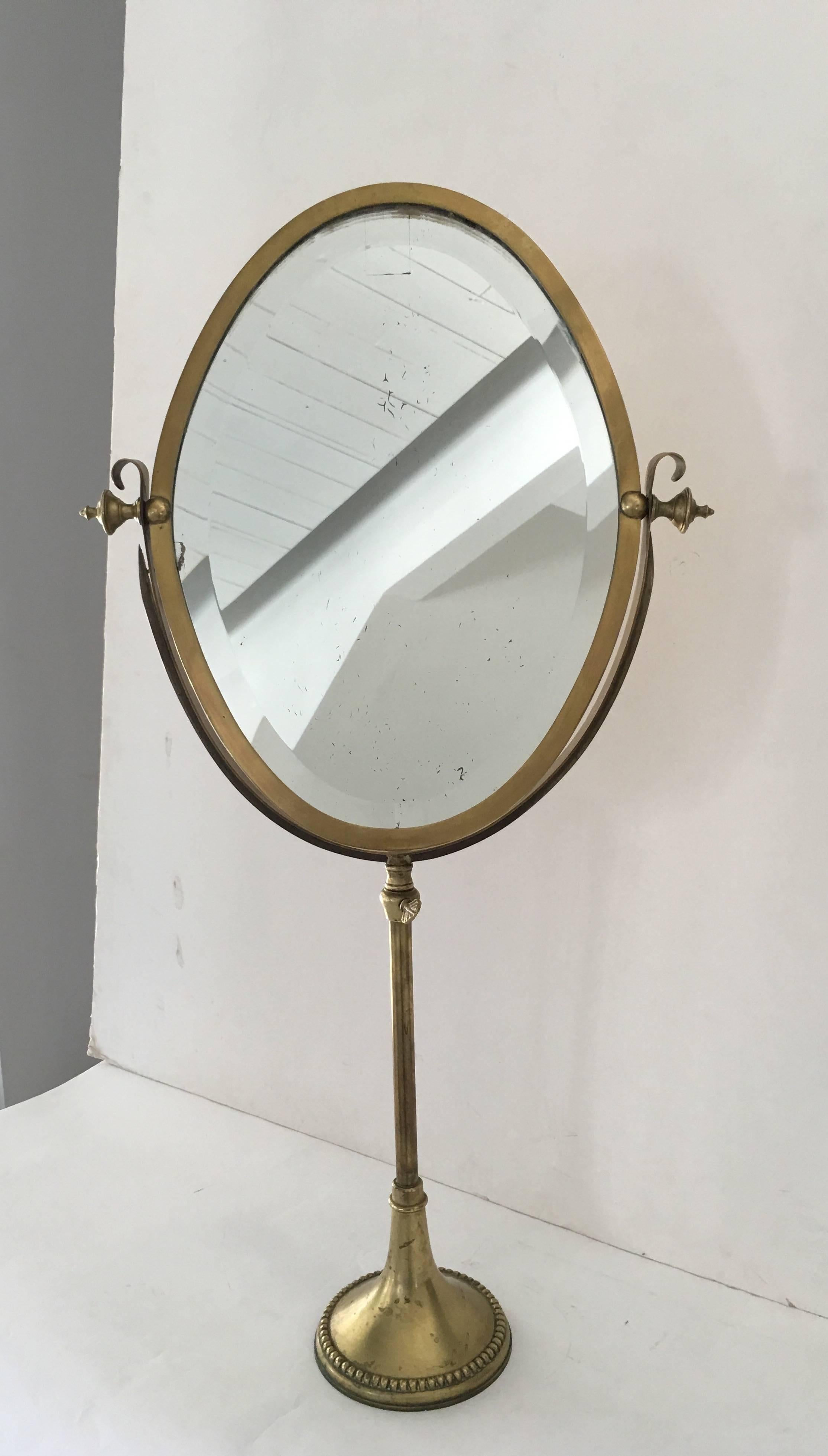 Exquisite adjustable French Fashion mirror, 1940s, combination of bronze and brass.