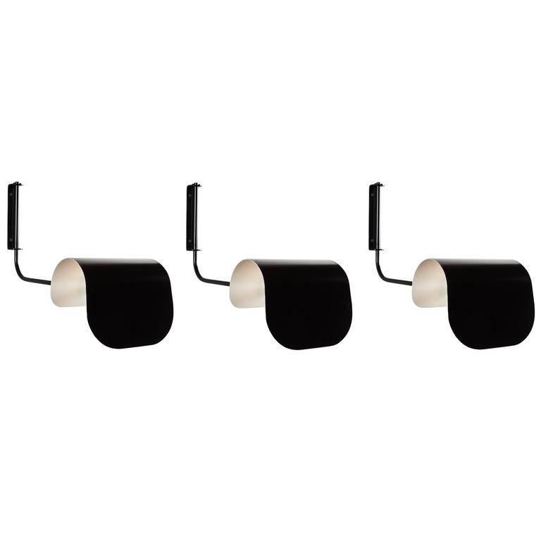 Set of Three Articulating Wall Lamps by Jacques Biny