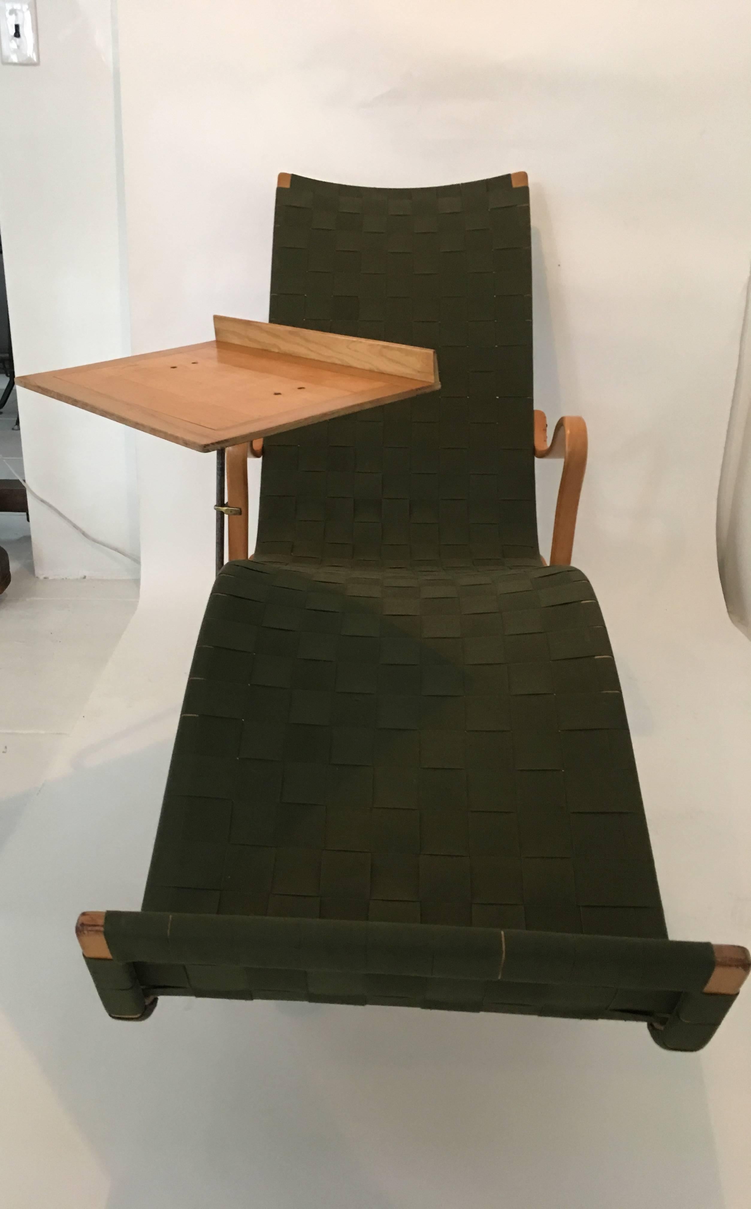 Gorgeous and unique lounge chair by Bruno Mathsson with adjustable reading tray, 1950s.