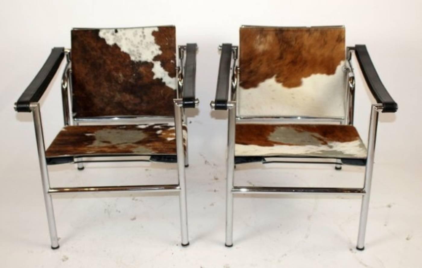 Very early model chairs by Le Corbusier and Pierre Jeannerete, cowhide with adjustable back, circa 1950s.