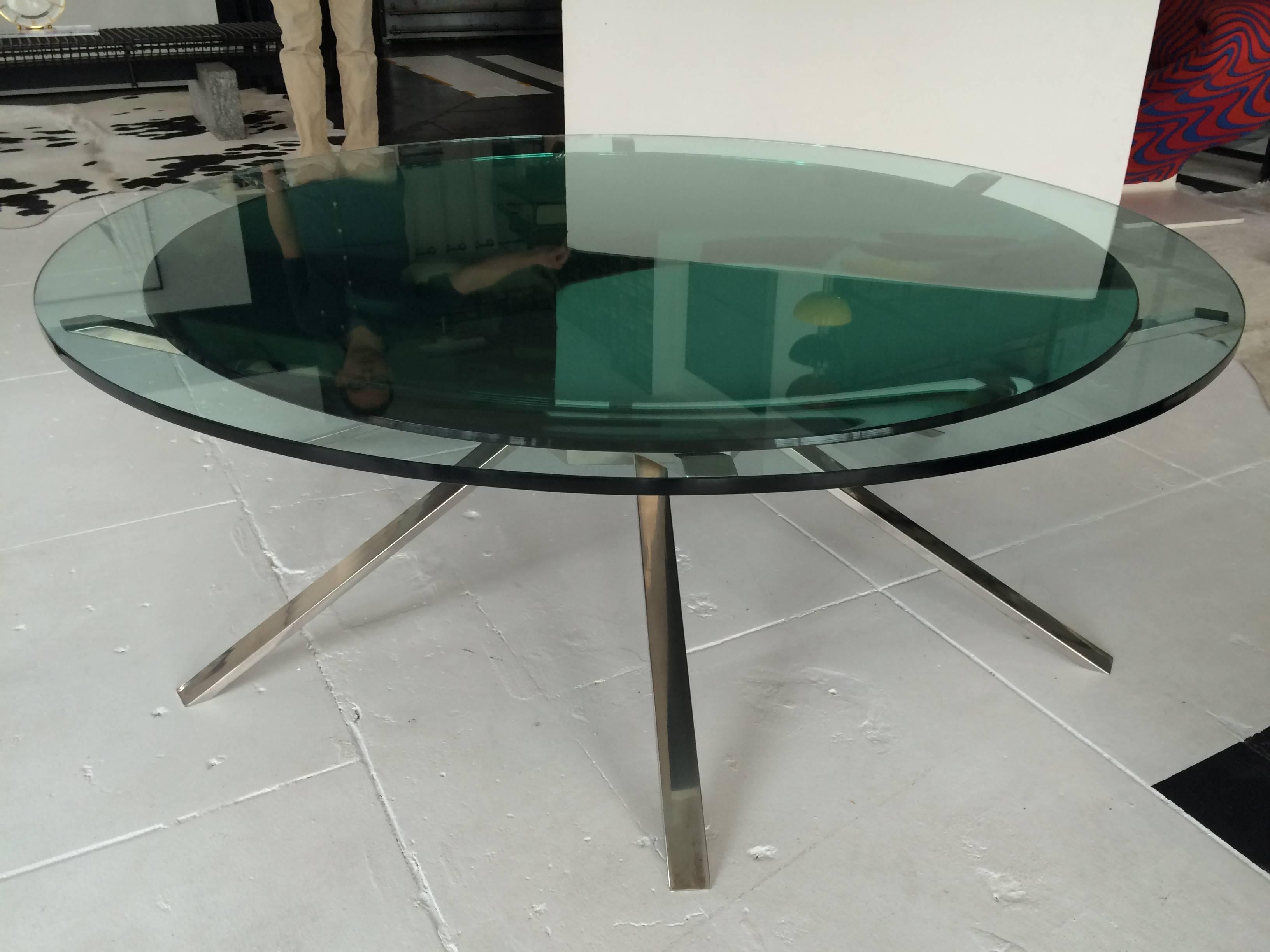 Very unique Italian coffee table with two glass-tops. Measures: First is green 1/2 inch thick mirror, second glass is clear 1/2 inch thick, chrome metal base.