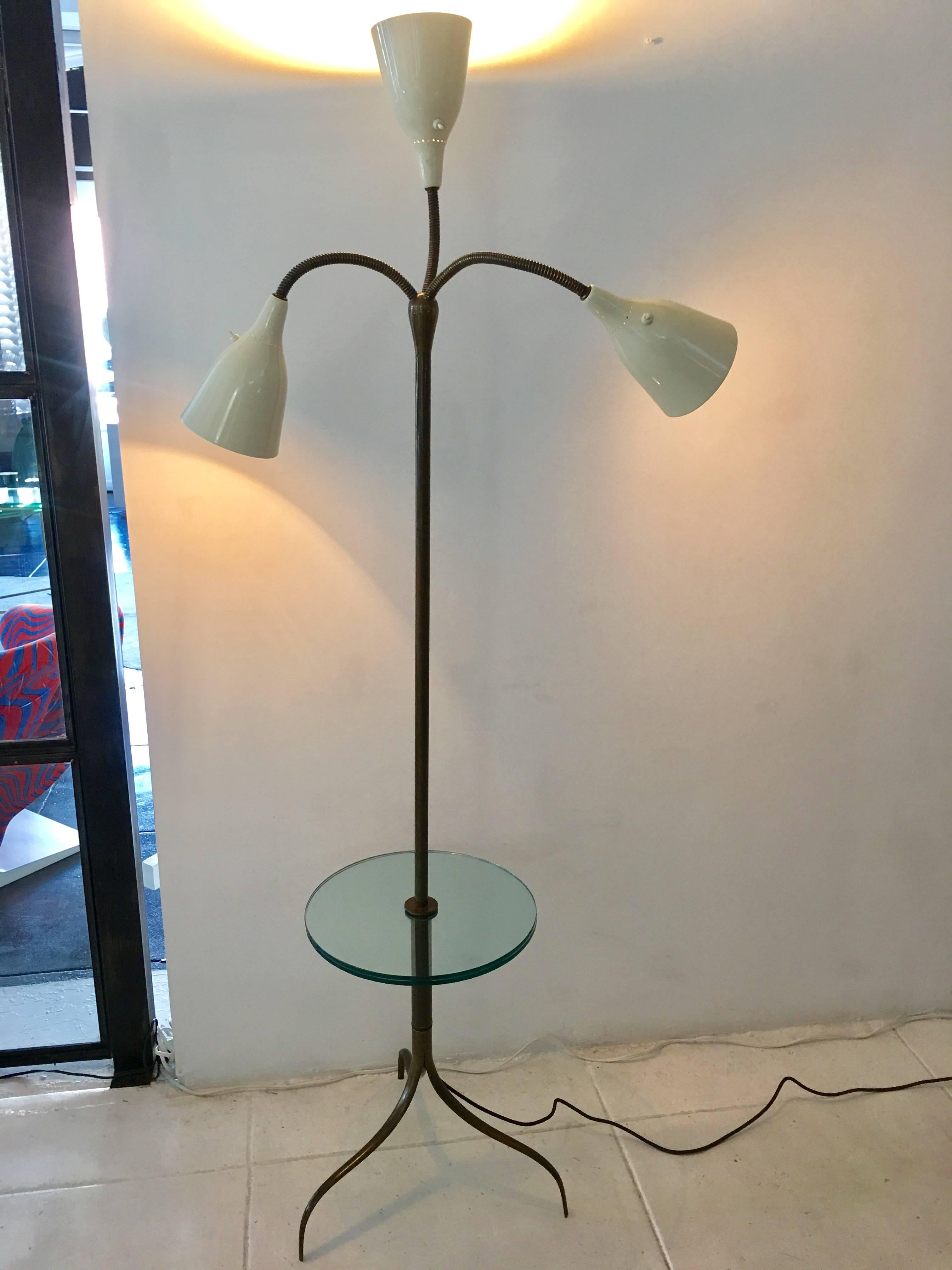 Stilnovo floor lamp, Italy, circa 1950. Brass, glass and enameled aluminum.
 