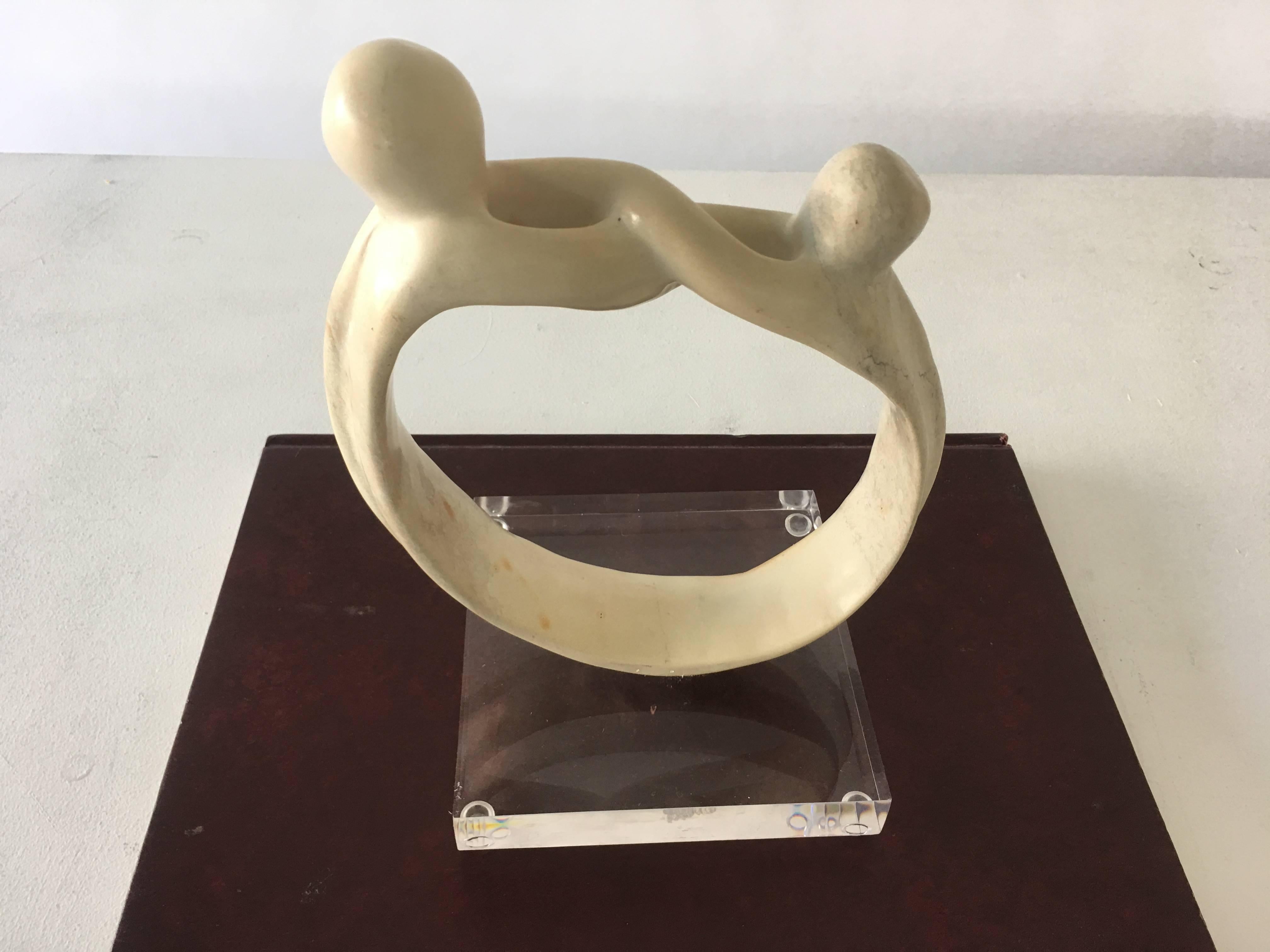 Beautiful abstract marble sculpture with one inch thick Lucite base, 1960s.