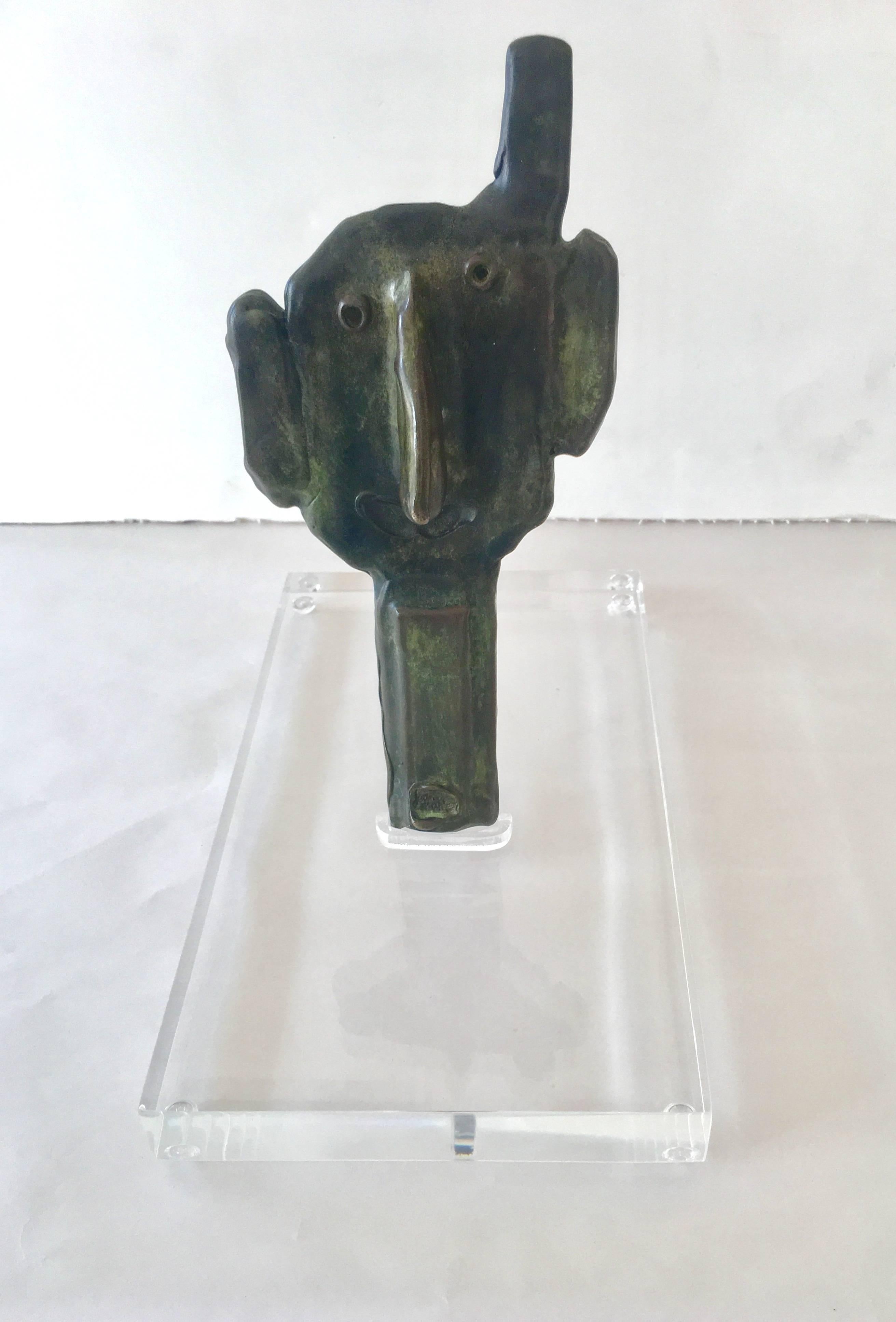 Very unique abstract sculpture, bronze, by Jean Mario Berti, 1950s. Hand signature etched on lower bottom.
Sculpture measures 9" H x 4.25" W x 2.5" D. Acrylic base measures 10" L x 6" W x 1.25" thick.
 