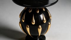 Tavolino scultoreo in stile Art Déco della collezione Alexanders, in oro 24 carati ed ebano