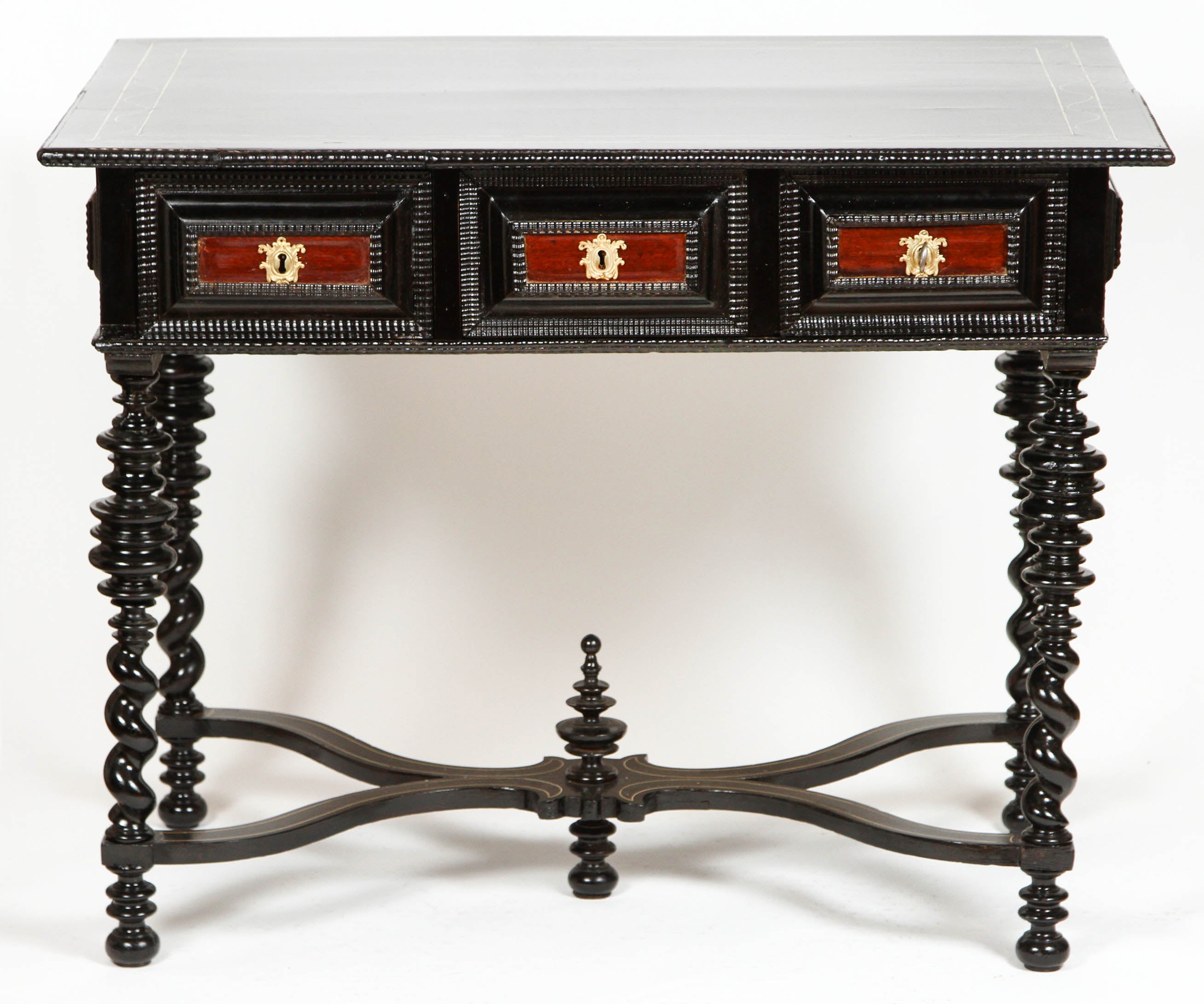 Occasional table in ebonized mahogany with natural mahogany drawers. Features turned legs and bone inlay detailing. Antique items are sold as-is.