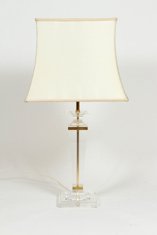 Pair of vintage Pair of lucite and brass Empire style lamps. Shade included. 
Wired for Europe.  

DIMENSIONS: 20