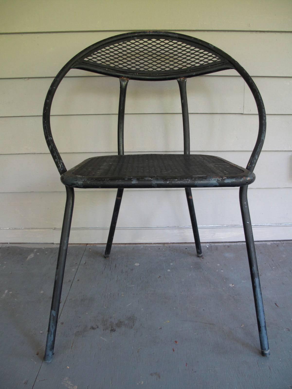 Four Salterini patio chairs. Hoop back with square seat. Wire mesh and painted tubular steel. Unmarked.