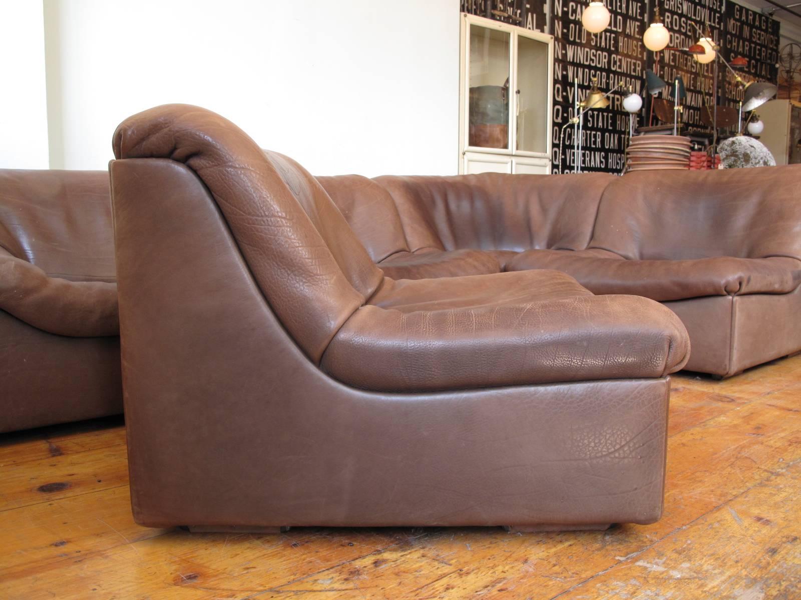 Late 20th century five-piece section sofa. Made by De Sede, Switzerland in the 1970s. Original buffalo leather.

Note: Measurements below apply to each individual piece.