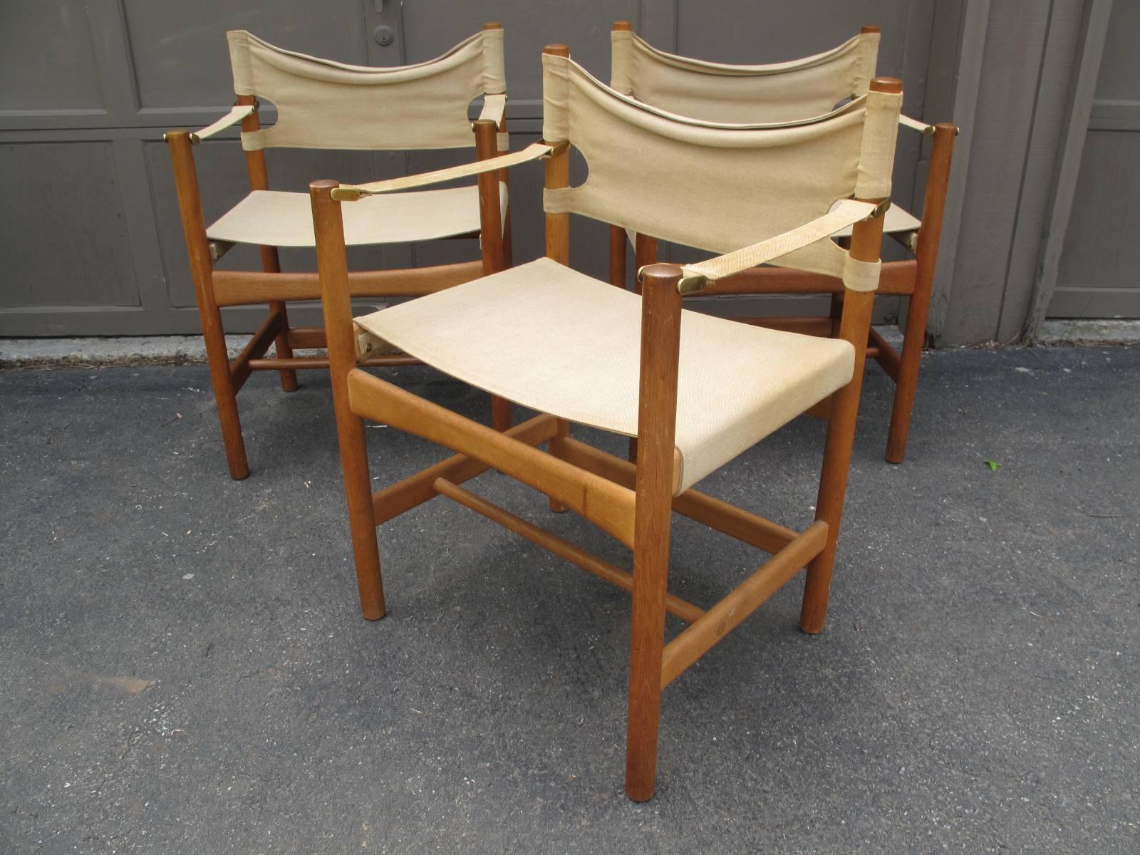 ONE remaining of the three pictured.  Designed by Danish designer Børge Mogensen for Fredericia.

Original canvas back, seat and arm rest. Brass fasteners. Original tags in tact as shown. 

