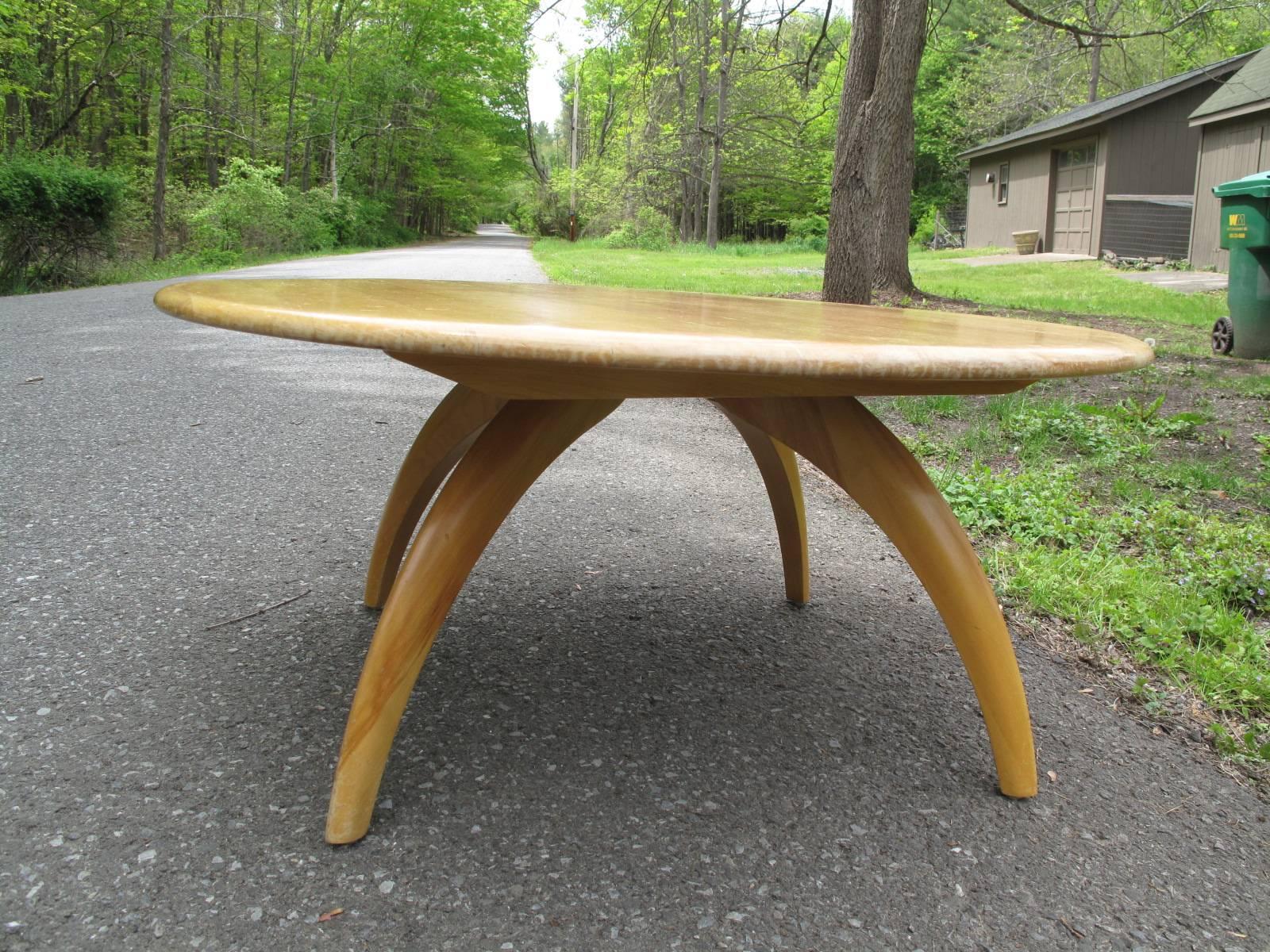 Round maple coffee table with Lazy Susan top. Gentle arc legs. Style of Heywood-Wakefield.