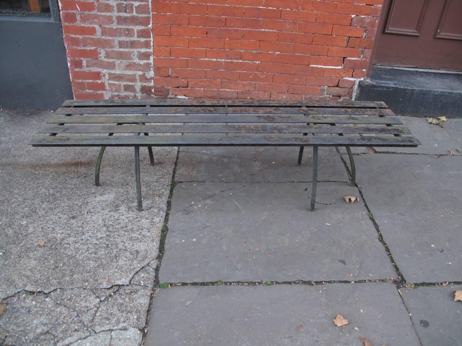 Two iron tripod bases. Remnants of original black paint.