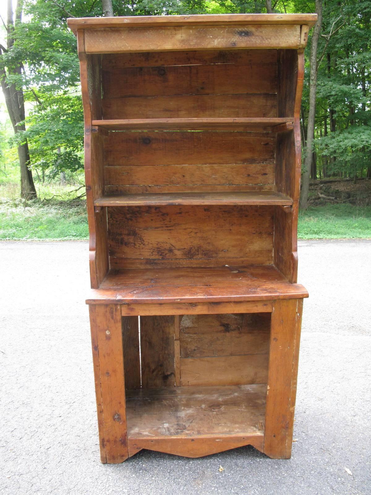 18th century American step back cupboard. Handmade construction. Two removable plank shelves.