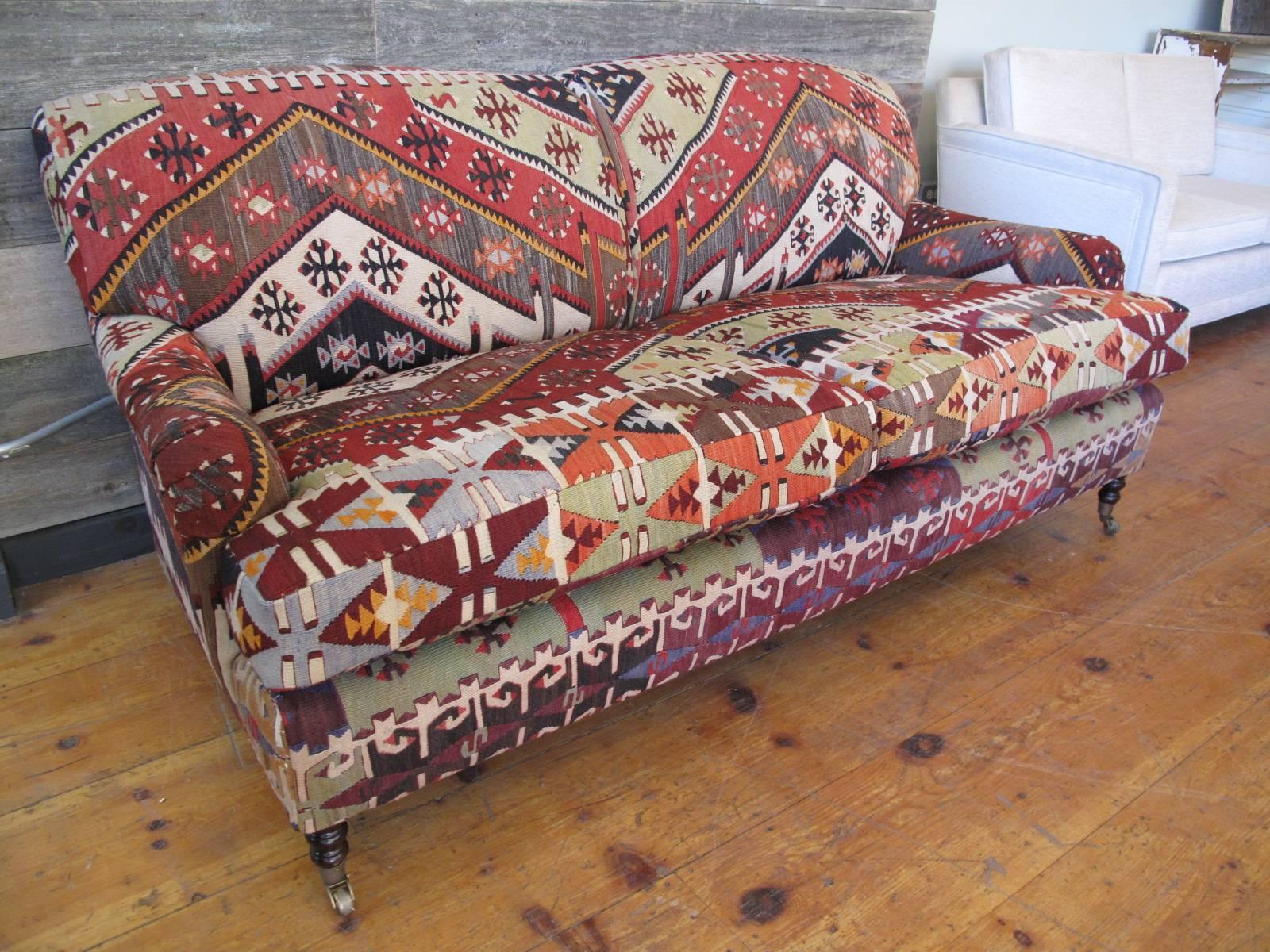Standard roll arm sofa, made in England by George Smith. Upholstered in Kilim. Original down cushions have been replaced with a custome foam insert.