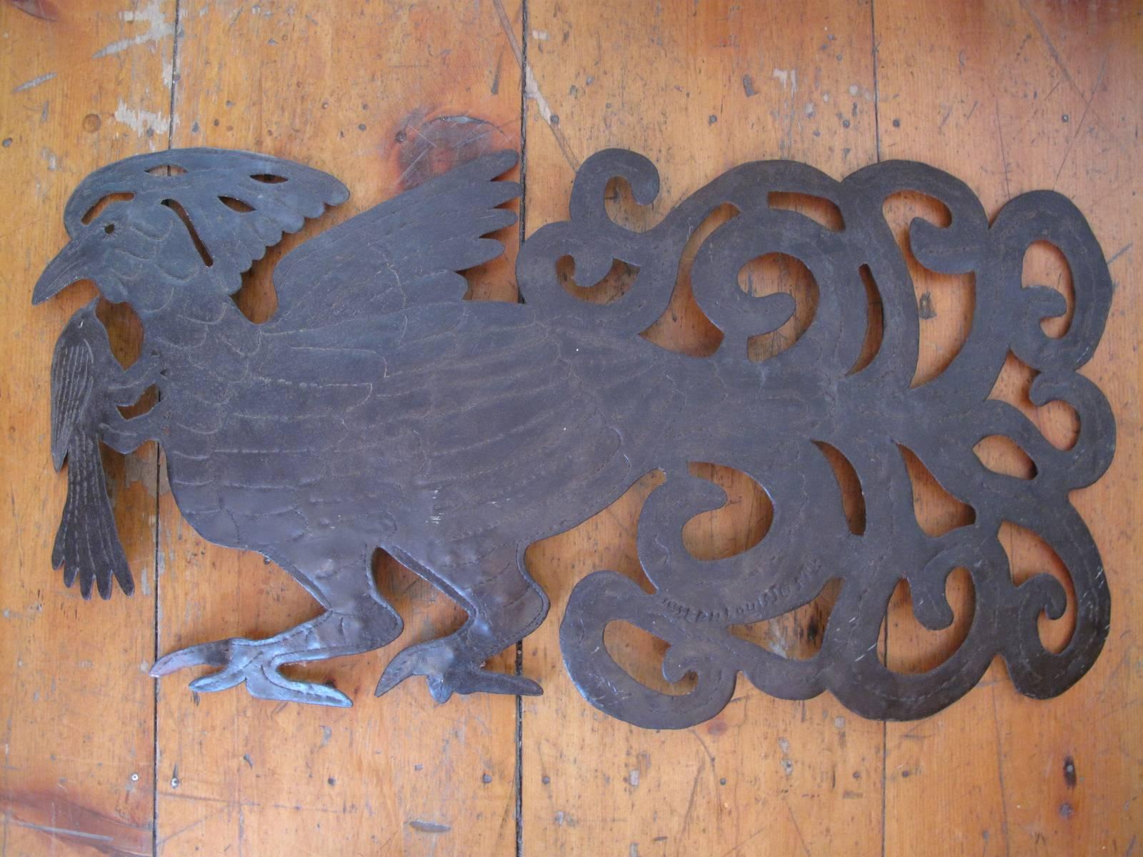 Large cut steel panel signed by Haitian self-taught artist Joseph Louis Juste.