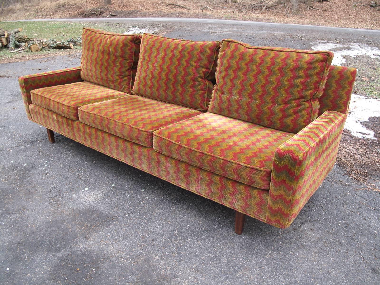 American Mid-Century Modern sofa in original patterned velvet upholstery. Manner of Dunbar.
