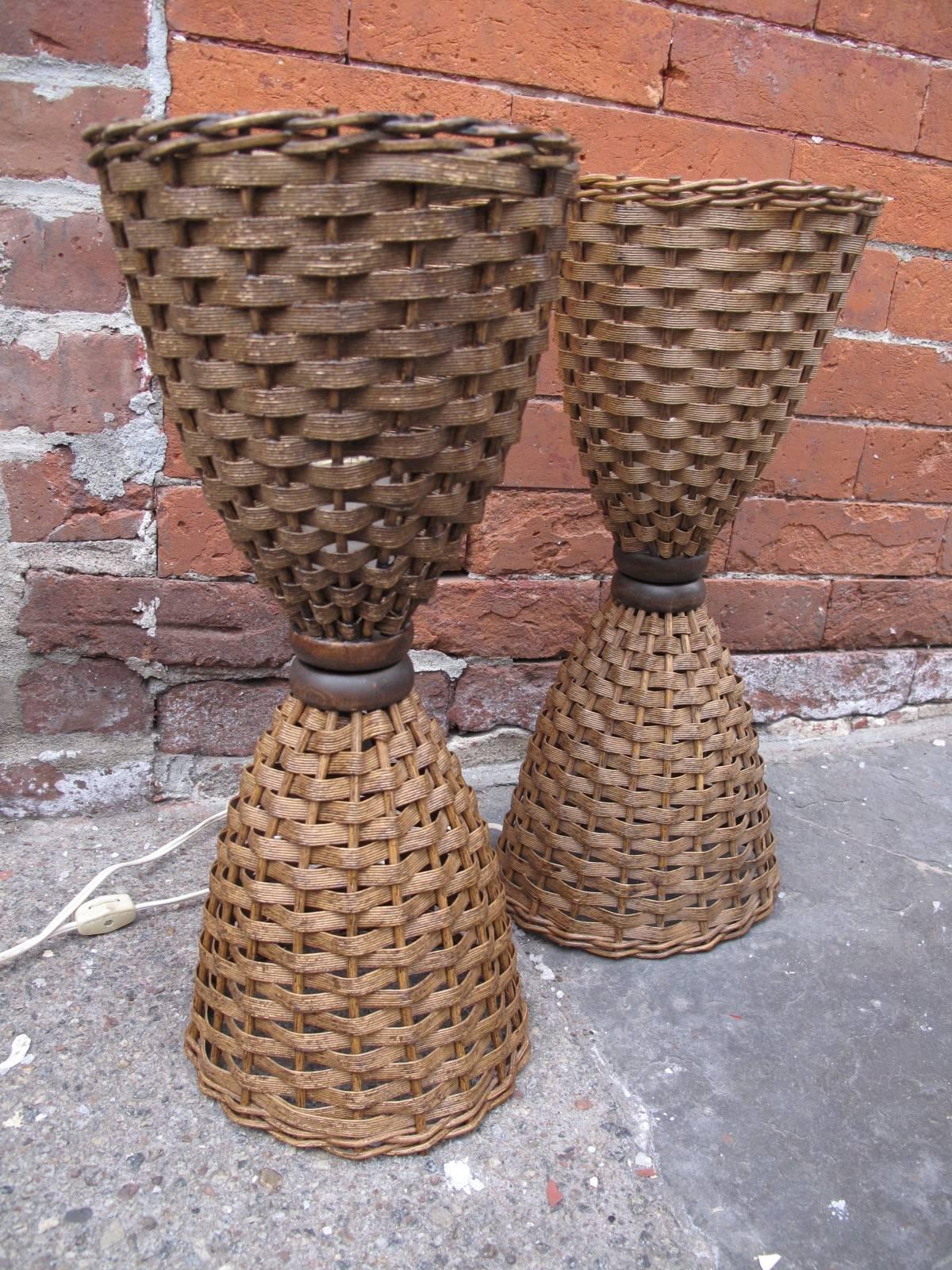 Two 20th century woven natural fiber lamps, each having a single socket.