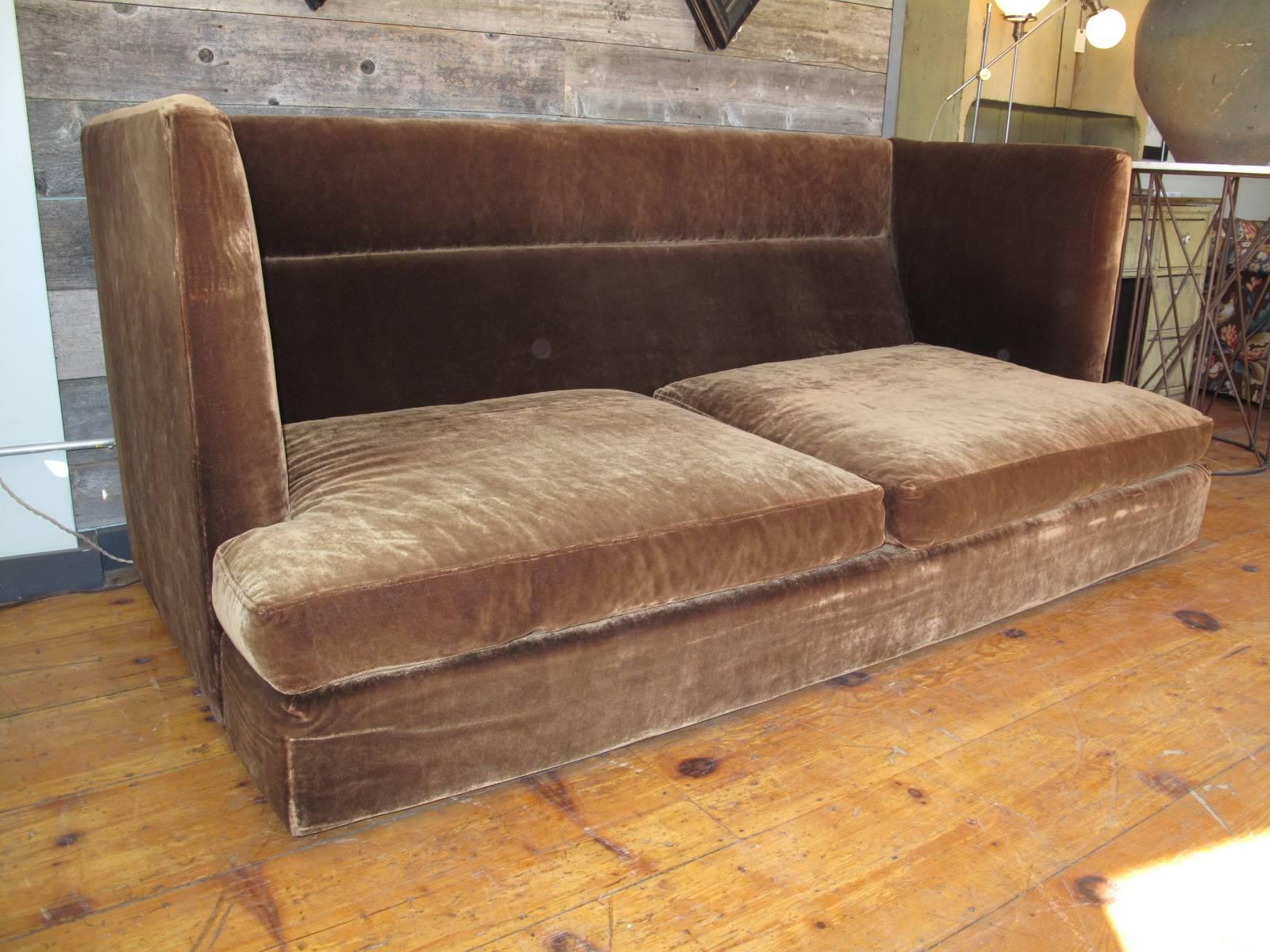Rare and dramatic shelter sofa designed by Milo Baughman for Thayer Coggin in the 1970s. Original tag on underside. Likely original chocolate brown velvet mohair upholstery. 

Can easily be taken apart in two pieces to fit through doorways.