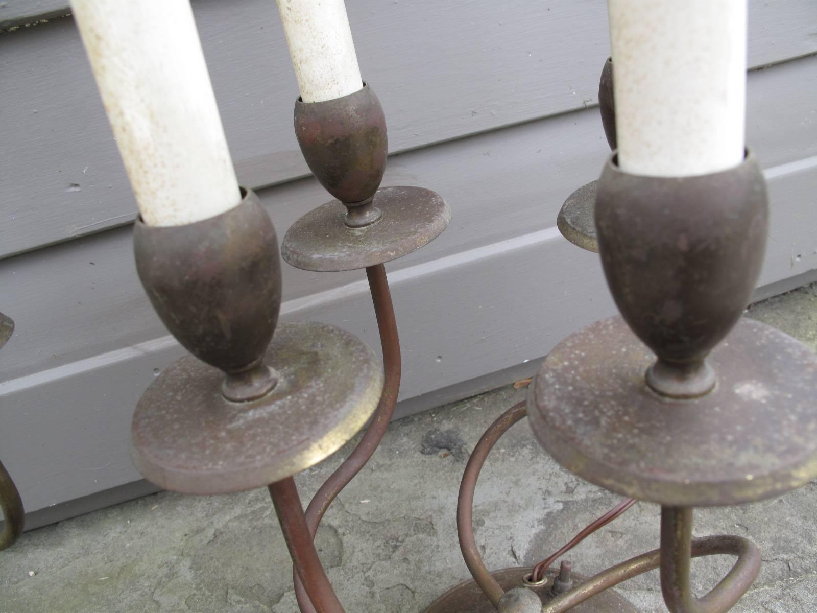 Two similar table lamps with four elegant curvilinear candelabra arms each. Available as a pair. 

Base diameter 5.75