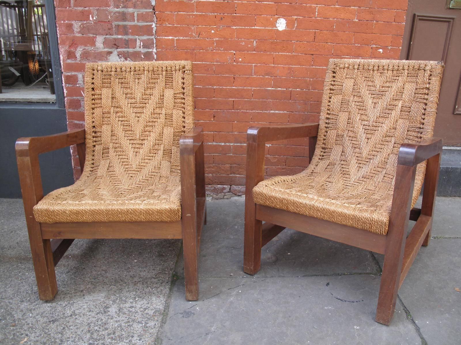 Pair of Armchairs with extremely solid hardwood frame, wrapped fiber seat and back. Made in Guatemala by Tyco.