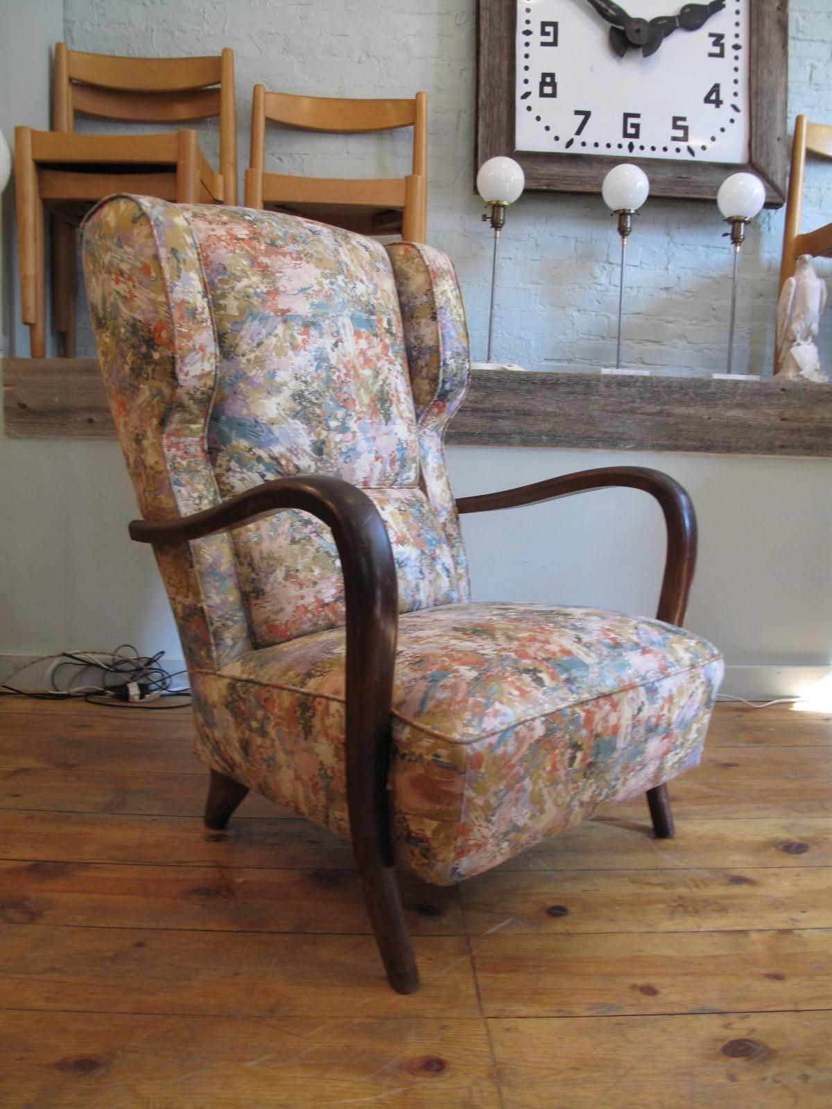 High back Italian armchair in the style of Paolo Buffa.
Wonderful exaggerated proportions. Abstract print on cotton, likely of the period.