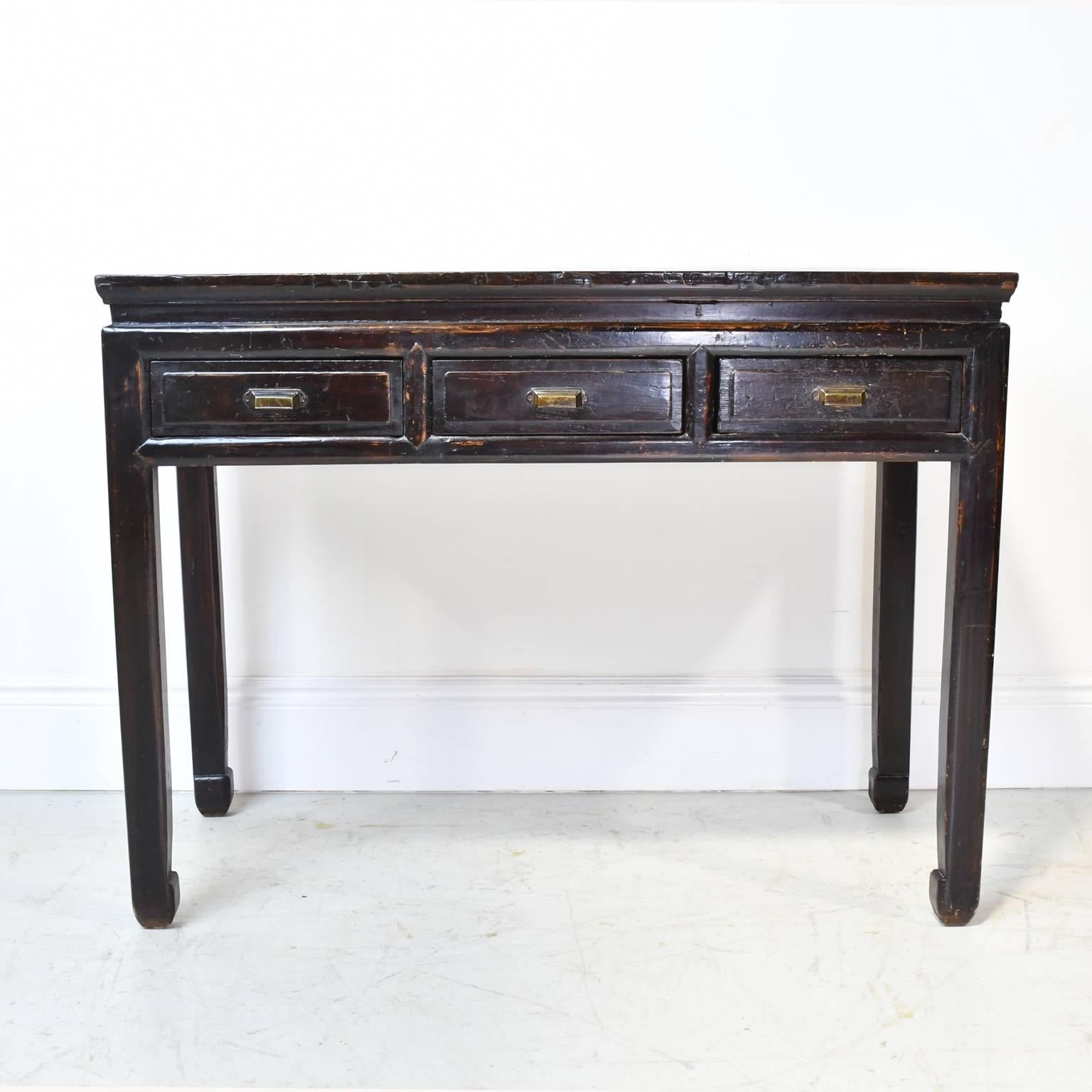 A very handsome 19th century Qing dynasty Chinese table on square legs with hoof feet and offering three drawers. Black-lacquer finish. China early 19th or late 18th century.
Note: You should always request a shipping quote.
Quoted amounts are an