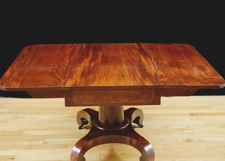 American Empire Greek Revival Drop Leaf Dining Table In Mahogany Polished American Empire Greek Revival Drop Leaf Dining Table In Mahogany Circa 1830 For