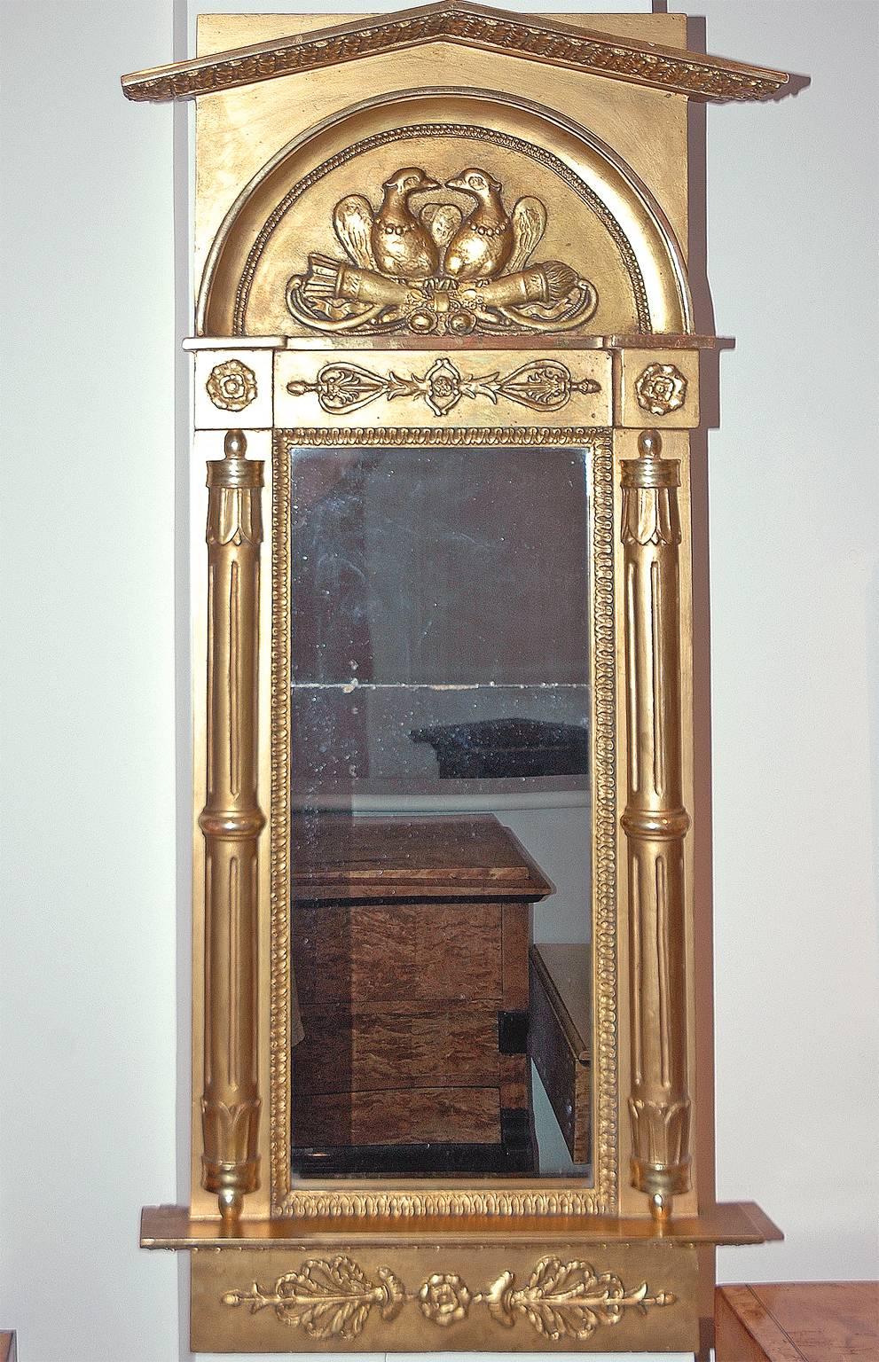 Karl Johan Empire gilded mirror with original silvered glass, Stockholm stamped 1827.
Measures: 22 1/2