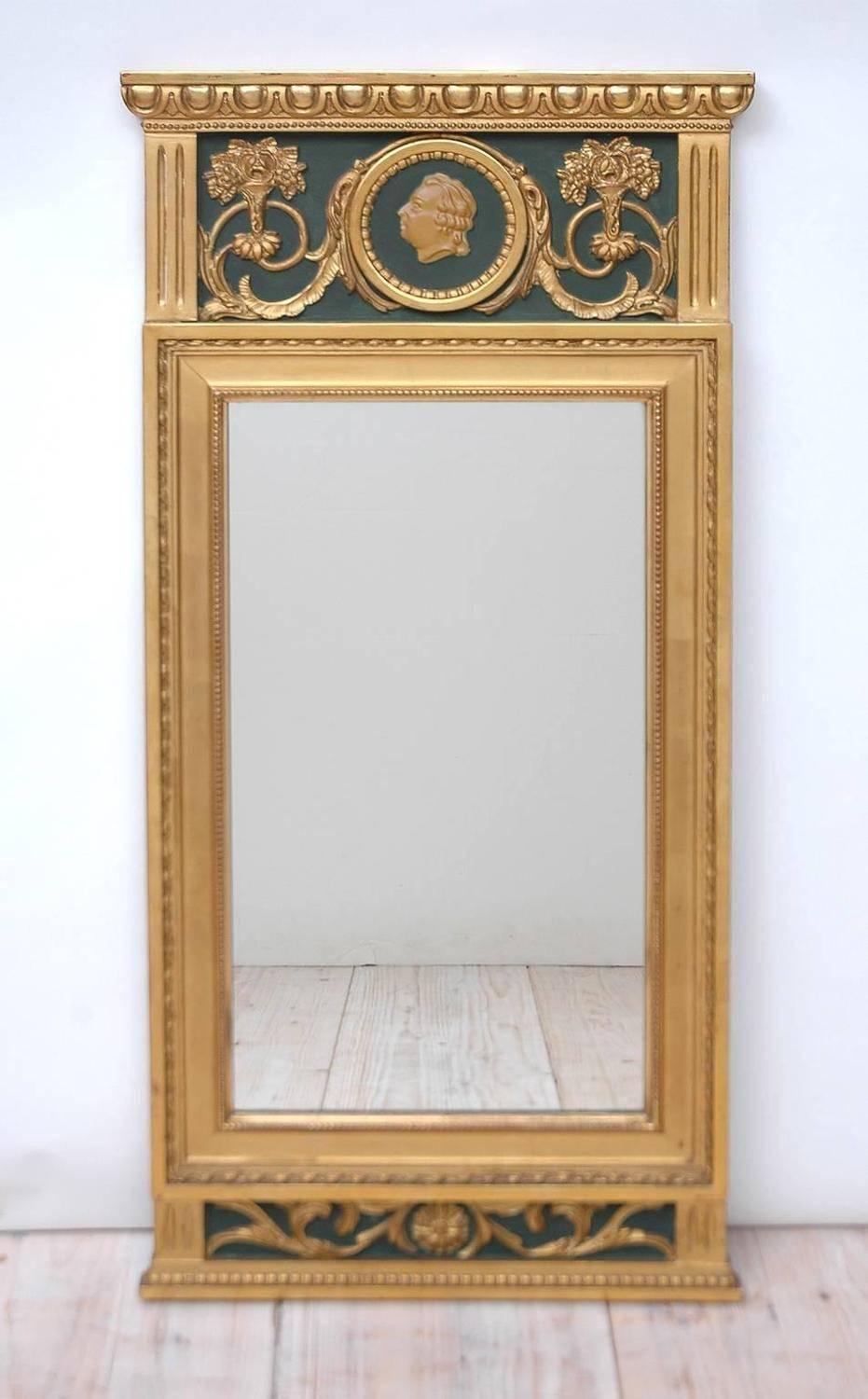 20th century Gustavian style mirror with gesso and carved wood with gold leaf applied.

Measures: 20 1/4