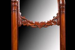 Danish Antique Decorative Arched Mirror in Mahogany w/ a Carved Bonnet and Swag