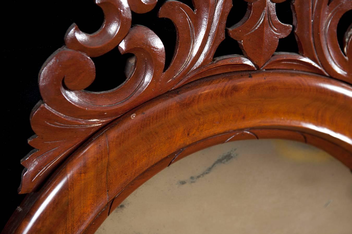 Louis Philippe Danish Antique Decorative Arched Mirror in Mahogany w/ a Carved Bonnet and Swag For Sale