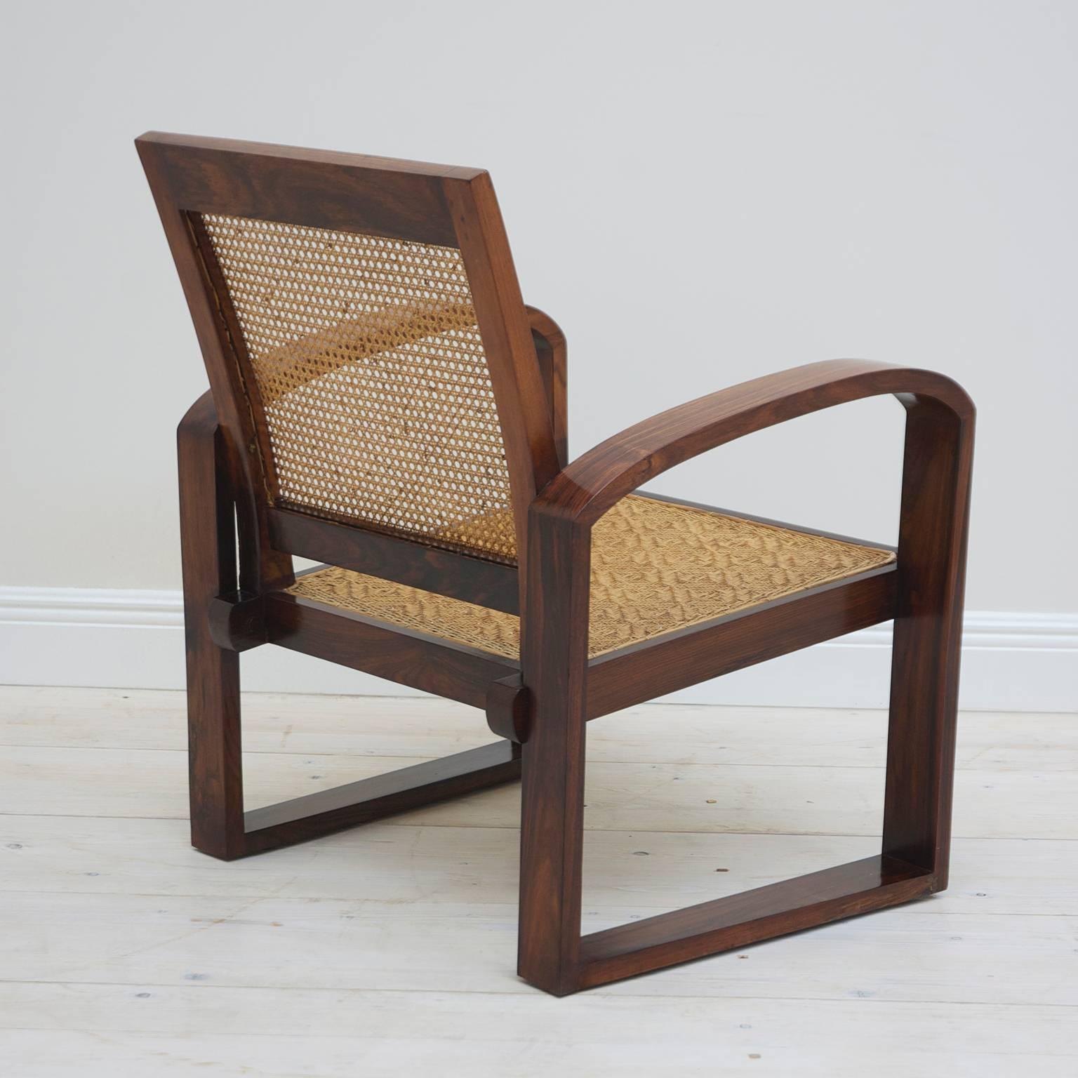 Polished 4 Art Deco French Colonial Rosewood Armchairs with Caned Backs and Woven Seats