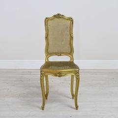 Paire de chaises Belle Epoque en bois doré de style Louis XV avec cannage