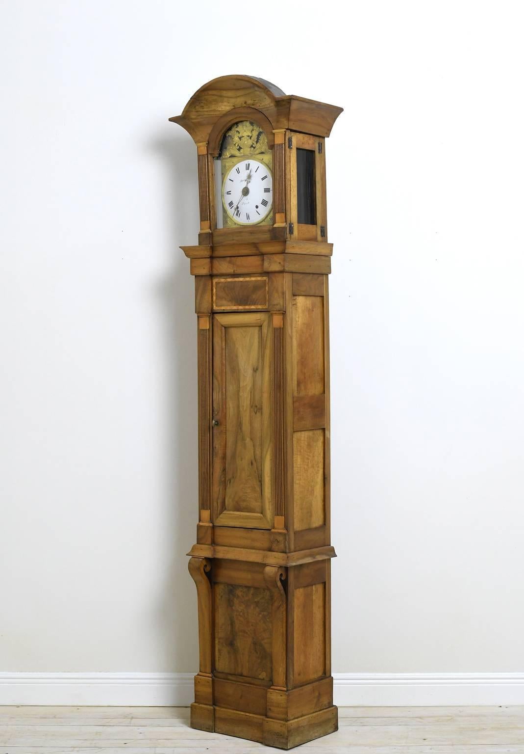 From the historically important city of Lyon, an impressive & well-proportioned late 18th century Louis XVI long-case clock in walnut with inlays. This Comtoise clock assembled in the Compté region of France was brought to Lyon by the 