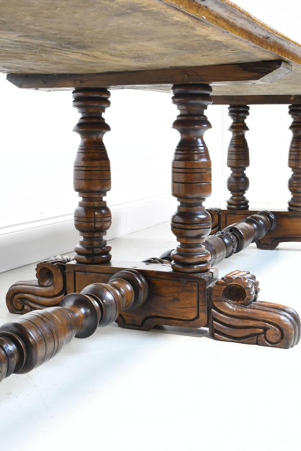 19th Century Spanish Colonial Rustic Dining Table with Carved Trestle Base In Excellent Condition In Miami, FL