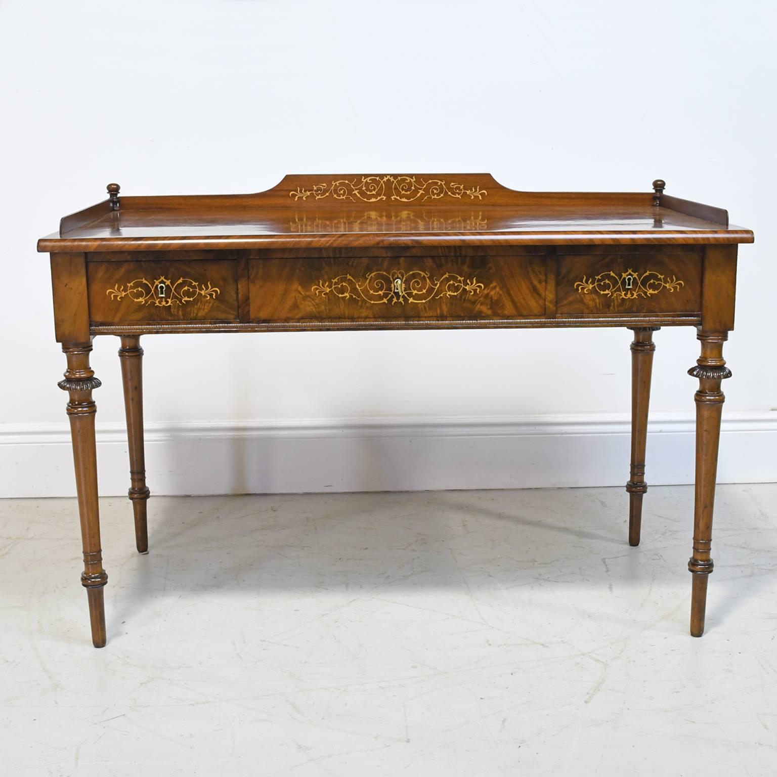 This exceptional writing table with three drawers is from the reign of Christian VIII of Denmark. The Cuban mahogany employed is of an extraordinary grade and the oxidation that has naturally occurred from exposure to light has left it with a