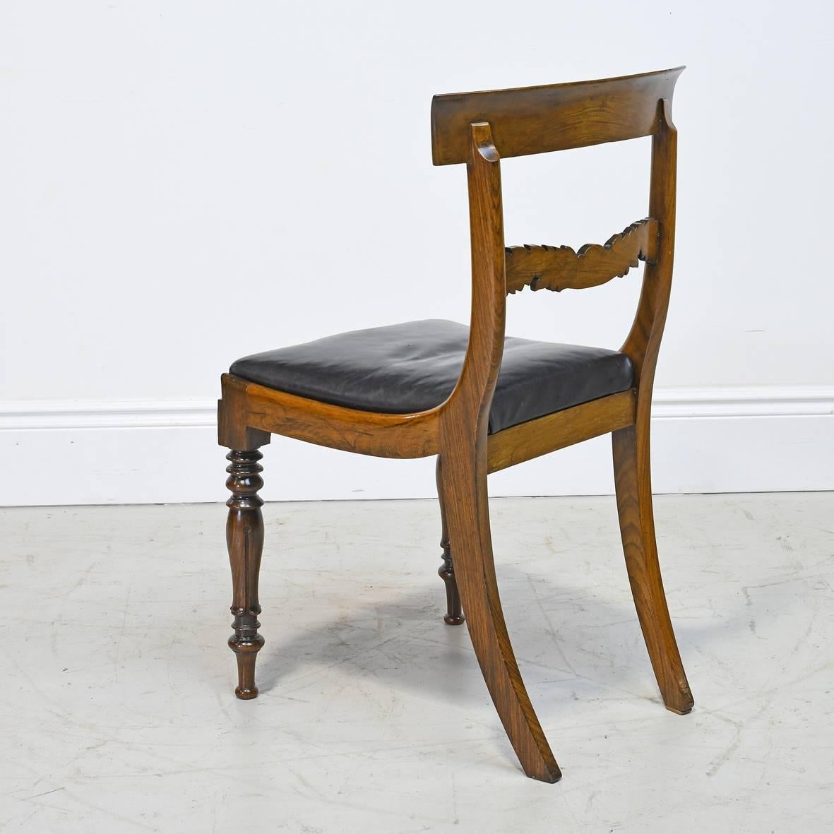 Carved English Regency Rosewood Chair with Black Leather Upholstery, circa 1830